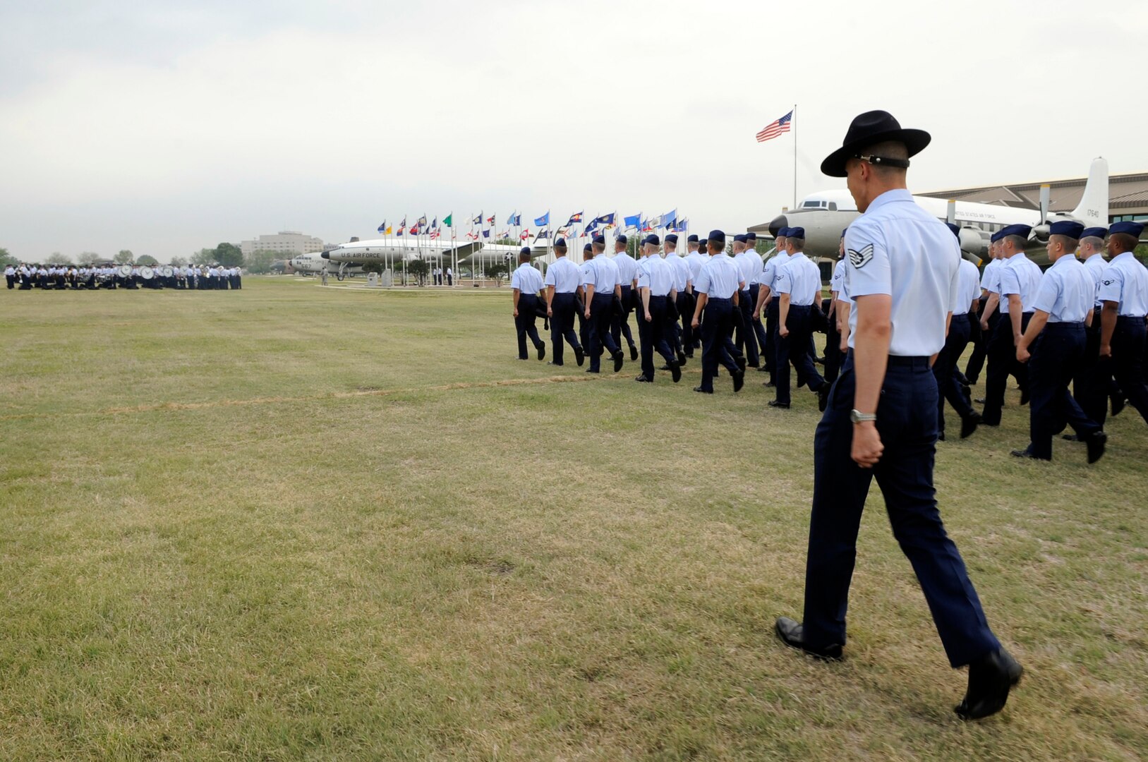 A military training instructor marches his flight on the parade grounds at Lackland Air Force Base, Texas, April 24 for their graduation ceremony. (U.S. Air Force photo/Staff Sgt. Desiree N. Palacios)

