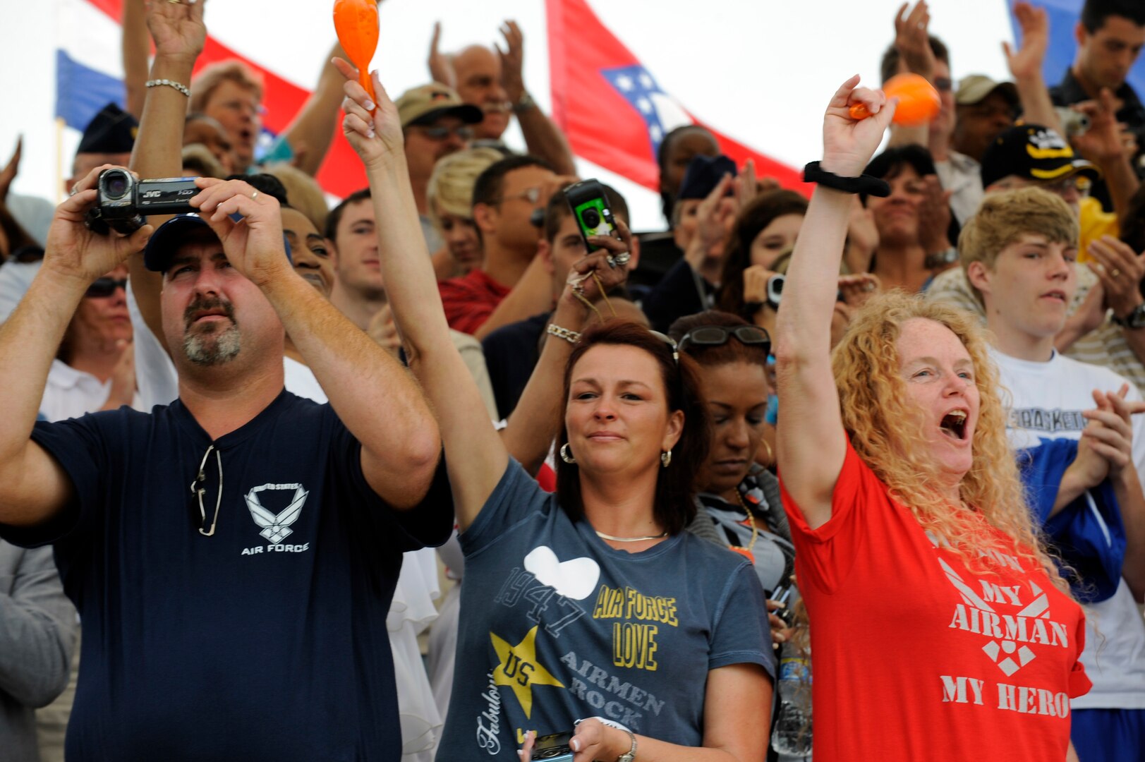 Family members yell and cheer as basic trainee graduate April 24 at Lackland Air Force Base, Texas. (U. S. Air Force photo/Staff Sgt. Desiree N. Palacios)