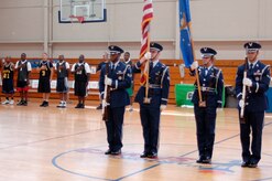 The base honor guard post the colors before the start of the intramural basketball championship game at the Fitness and Sports Center here April 23. The 437th Force Support Squadron and the 437th Civil Engineer Squadron played for the base championship. The 437 CES defeated the 437 FSS 47-31. (U.S. Air Force photo/Staff Sgt. Marie Cassetty)(RELEASED)