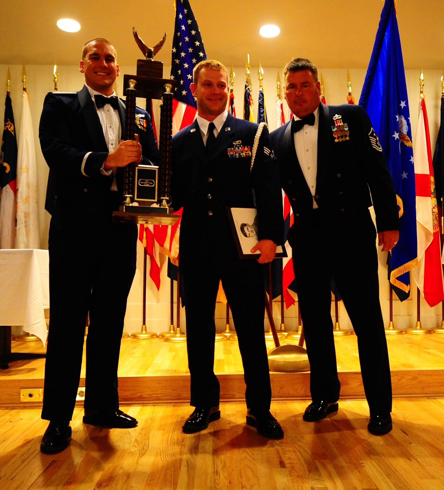 DYESS AIR FORCE BASE, Texas - Senior Airman Andrew Young (center) is this week's Warrior of the Week. Airman Young recently received the John L. Levitow award at the Dyess Airman Leadership School. The Levitow award is given top professional military education graduate from an Air Force Airman Leadership School. Airman Young is a member of the 9th Air Support Operations Squadron.  (U.S. Air Force photo by Staff Sgt. Alan Garrison)