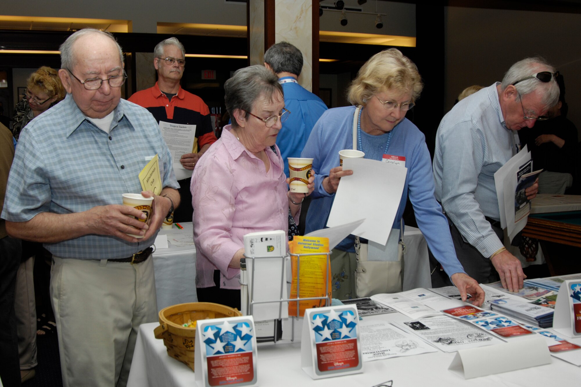 HANSCOM AIR FORCE BASE, Mass. – Attendees to the 29th Annual Retiree Activity Day check out one of the many informational tables that were set up during the event to provide retirees from across the New England area with updates on vital information and benefits. The event took place at the Minuteman Club on April 25 and was sponsored by the Hanscom Retiree Activities Office.  More than 200 retirees attended the event, Col. David Orr, 66th Air Base Wing commander, was the guest speaker. (U.S. Air Force photo by Linda LaBonte Britt) 