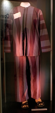 DAYTON, Ohio - Typical prison-issue POW clothing. In hot weather, POWs often wore only shorts. Also on display are prison issue sandals made from old tires and inner tubes. Items are on display in the Return with Honor: American Prisoners of War in Southeast Asia exhibit in the Southeast Asia War Gallery at the National Museum of the U.S. Air Force. (U.S. Air Force photo)