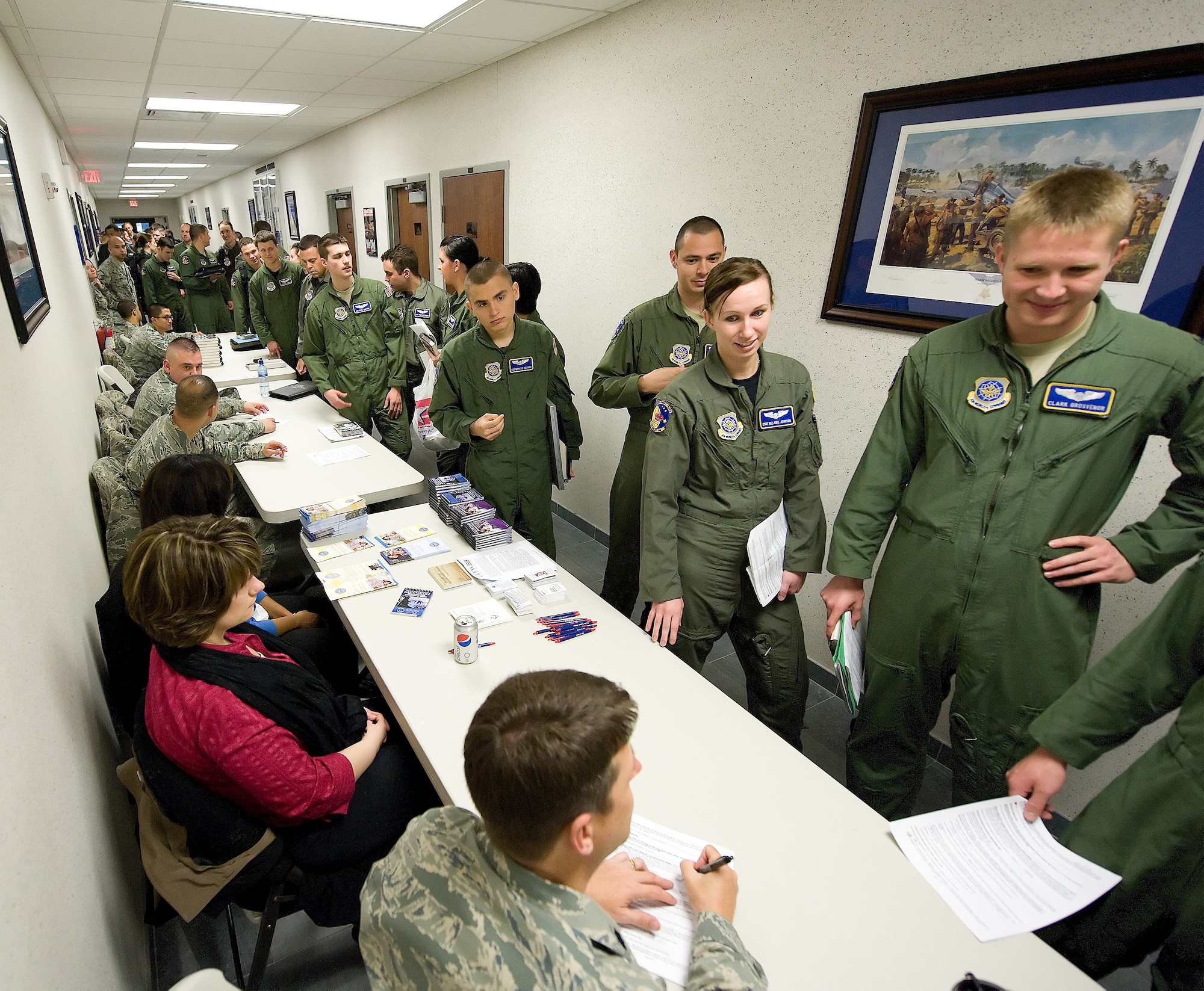 3rd Airlift Squadron members process through a deployment line to prepare for their squadron deployment.  The 3rd Airlift Squadron deployed for the first time April 26.  (U.S. Air Force photo\Jason Minto)