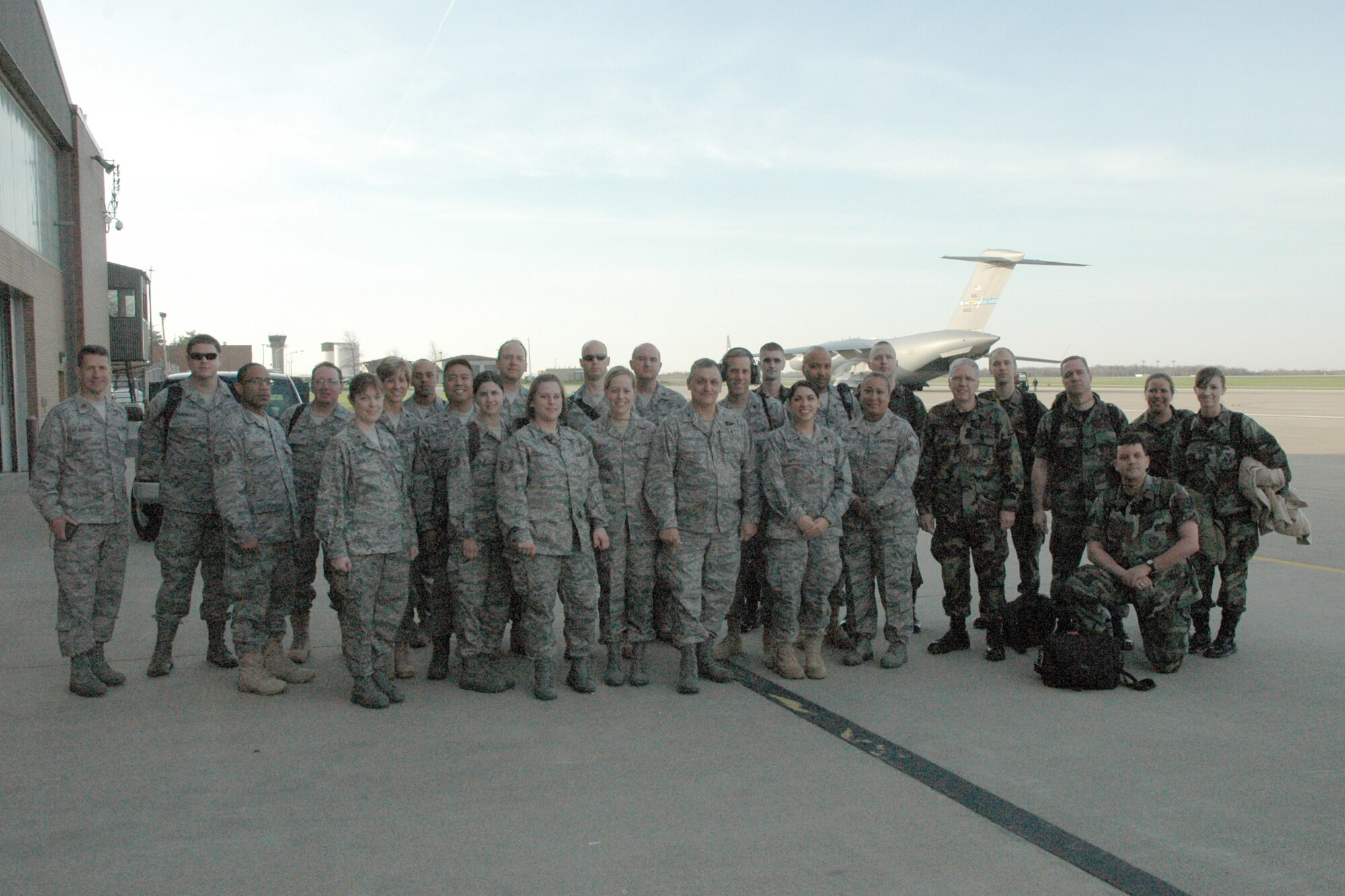 YOUNGSTOWN AIR RESERVE STATION, Ohio - A team of more than 25 specialists assigned to the 910th Medical Squadron and three 910th Airlift Wing Public Affairs personnel climbed aboard a
C-17 Globemaster jet-powered cargo transport aircraft here Sunday, April 26. The group of Air Force Reservists are headed to the Dominican Republic to conduct a Medical Readiness Excercise (MEDRETE). During the mission, scheduled to last until May 8, the medical team will provide family, dental and eye care to approximately 1,000 people per day. U.S. Air Force photo by Mr. Steve Pacer.  