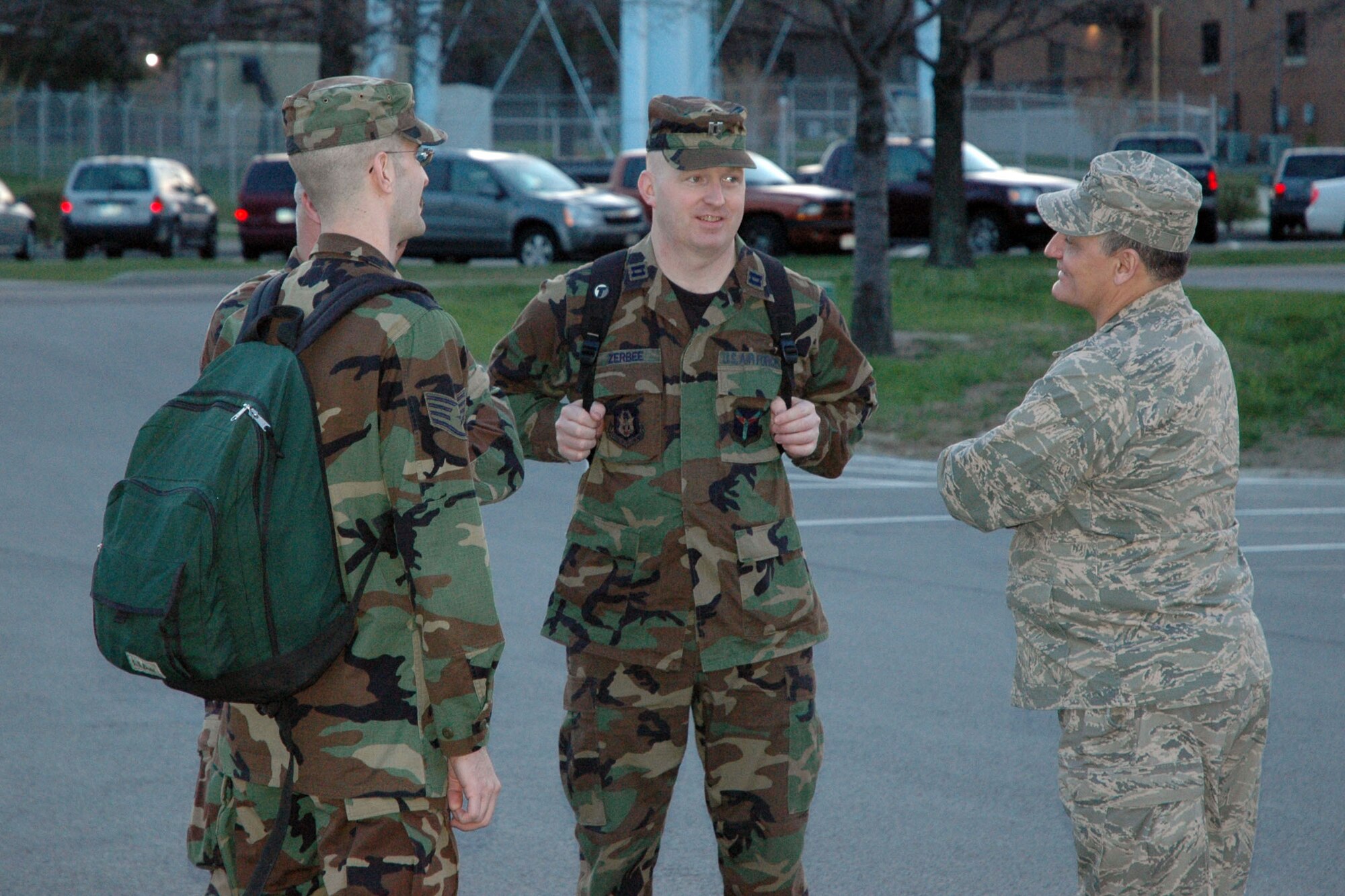 YOUNGSTOWN AIR RESERVE STATION, Ohio - Air Force Reserve Col. Ronnie Roberts (right), commander of the 910th Medical Squadron here, talks with a small group of specialists about their upcoming mission, Dominican Republic MEDRETE (Medical Readiness Training Exercise) 2009 in the early morning hours of Sunday, April 26. The Col. Roberts and his team of more than 25 medical specialists and three 910th Airlift Wing Public Affairs personnel departed here Sunday, April 26 for the mission scheduled to last until May 8. The medical specialists will provide family, dental and eye care to approximately 1,000 people per day during their mission in the Dominican. U.S. Air Force photo by Tech. Sgt. Bob Barko Jr.  