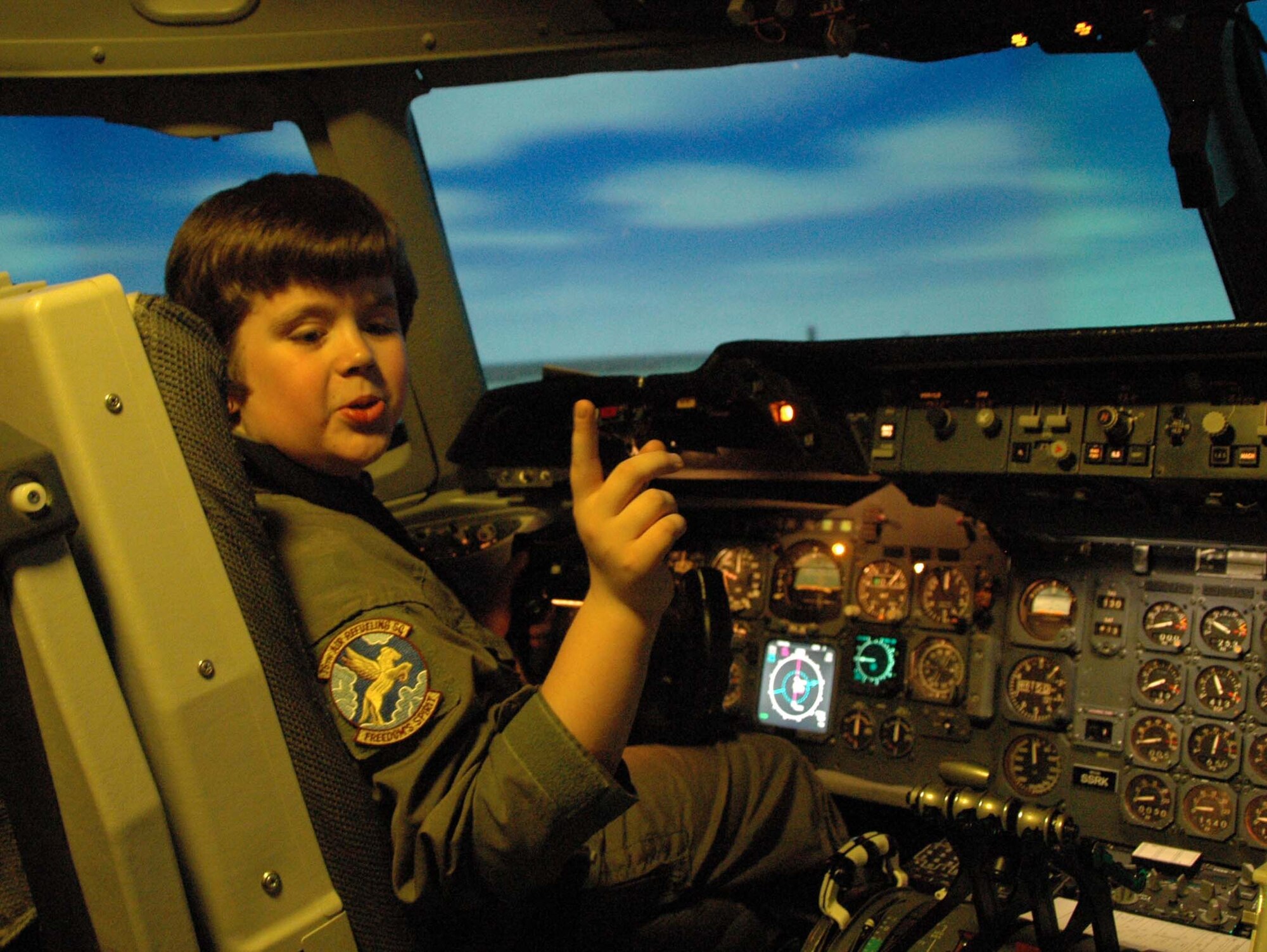 MCGUIRE AIR FORCE BASE, N.J. - Josh Shafer, a 10-year old cancer survivor was Hero for the Day here in April. Here Josh sits in the aircraft commander's seat of a C-17 Globemaster III simulator.  (U.S. Air Force photo/Staff Sgt. Monica Dalberg)