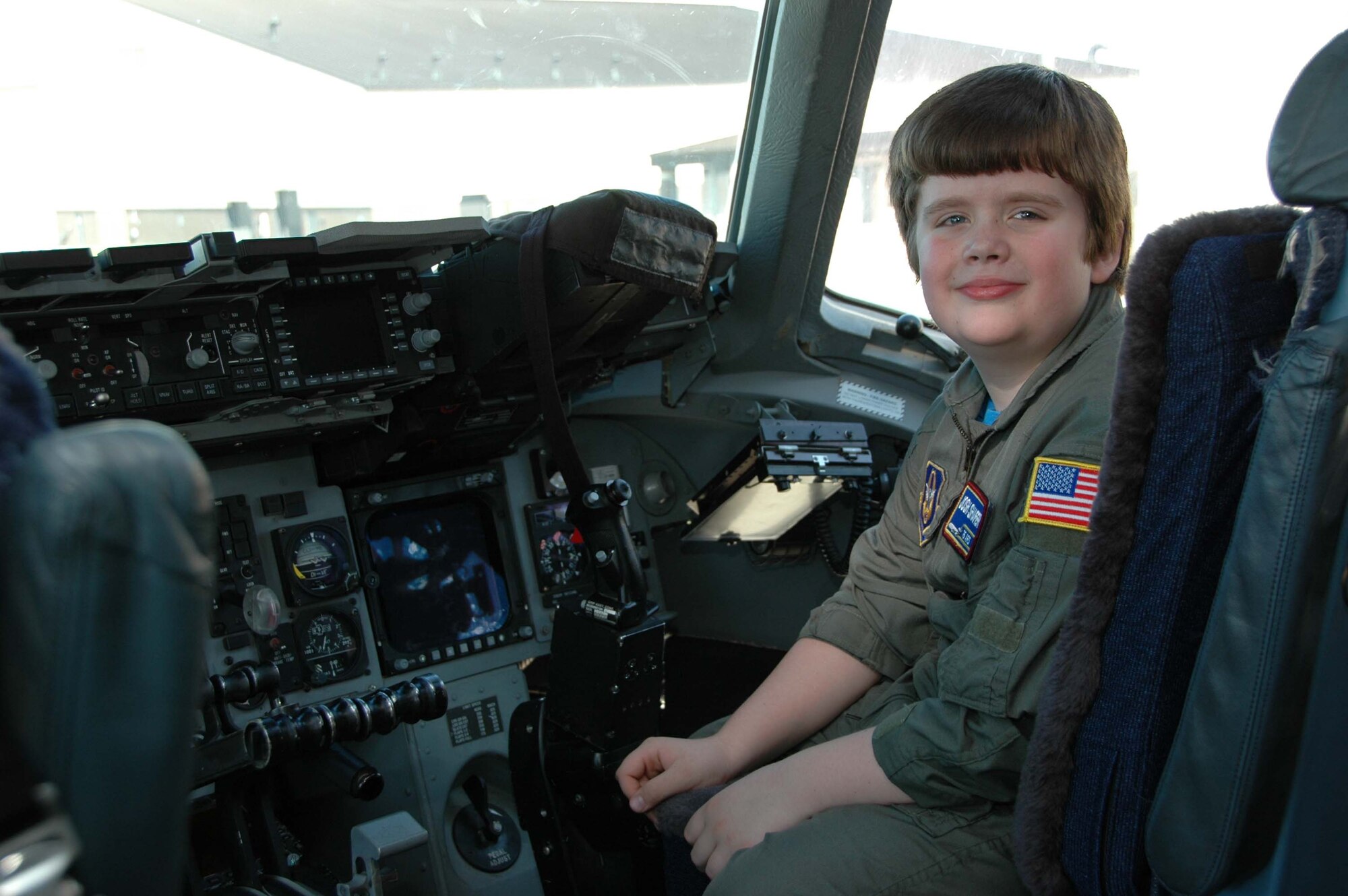 MCGUIRE AIR FORCE BASE, N.J. - Josh Shafer, a 10-year old cancer survivor was Hero for the Day here in April. Here Josh enjoys the view from the cockpit of a C-17 Globemaster III.  (U.S. Air Force photo/Staff Sgt. Monica Dalberg)