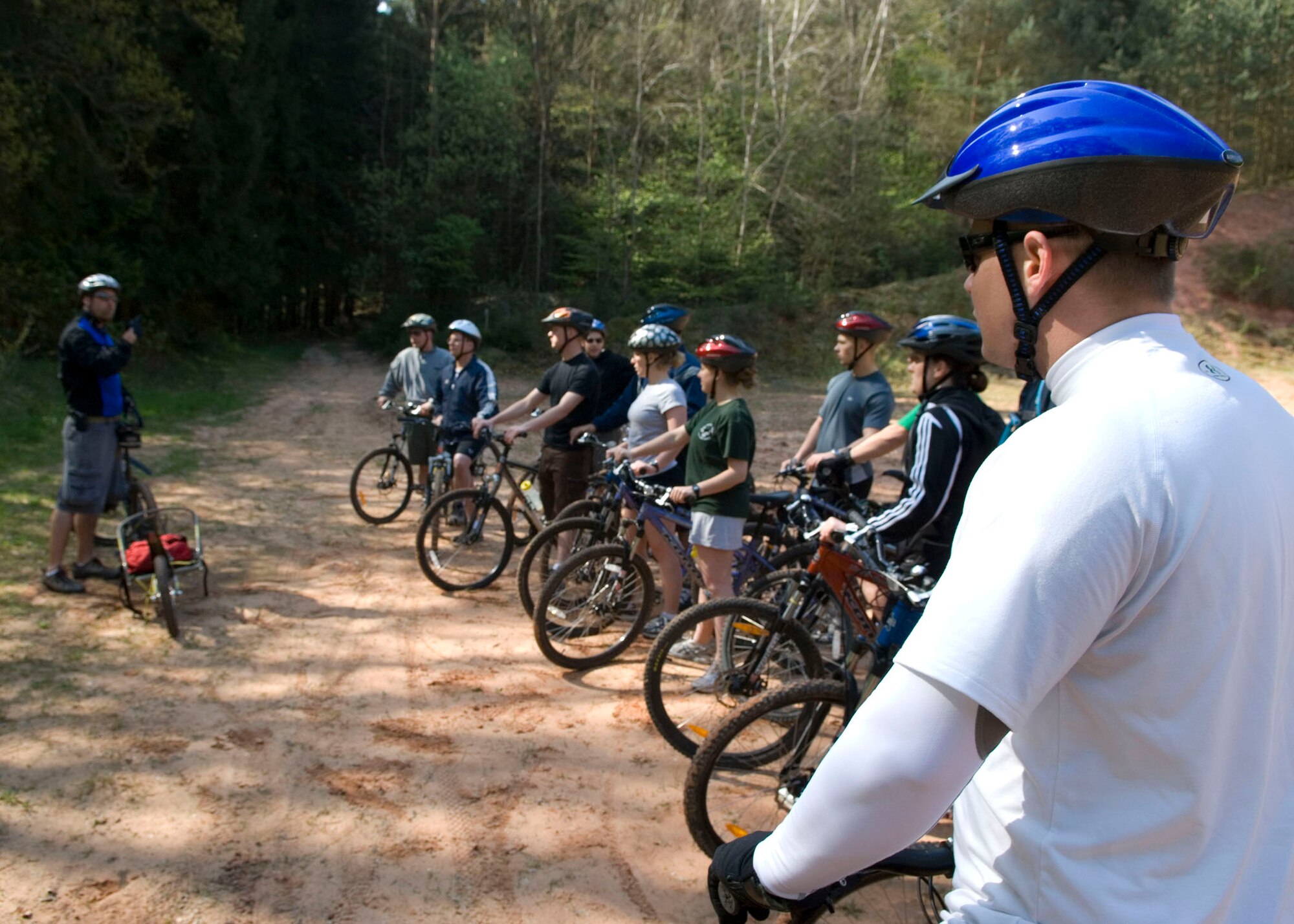 SPANGDAHLEM AIR BASE, Germany -- A group of 52nd Fighter Wing Airmen watch attentively as Jeff Haegerty, 52nd Force Support Squadron, gives instructions before they go mountain biking April 24, 2009. The Airmen had the opportunity to participate in this recreational activity as part of their two week First Term Airmen Center class. (U.S. Air Force photo by Airman 1st Class Nicholas Wilson)