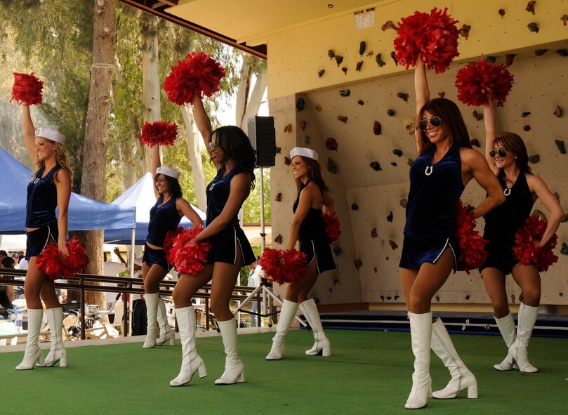 The Indianapolis Colts cheerleaders perform a dance routine dressed as four services of the military on April 25, 2009, at Incirlik’s Spring Fling at Incirlik Air Base, Turkey.  The cheerleaders arrived at Incirlik to boost morale and performed over a half hour’s worth of entertainment for base personnel and families.  (U.S. Air Force photo/Airman 1st Class Amber Russell)
