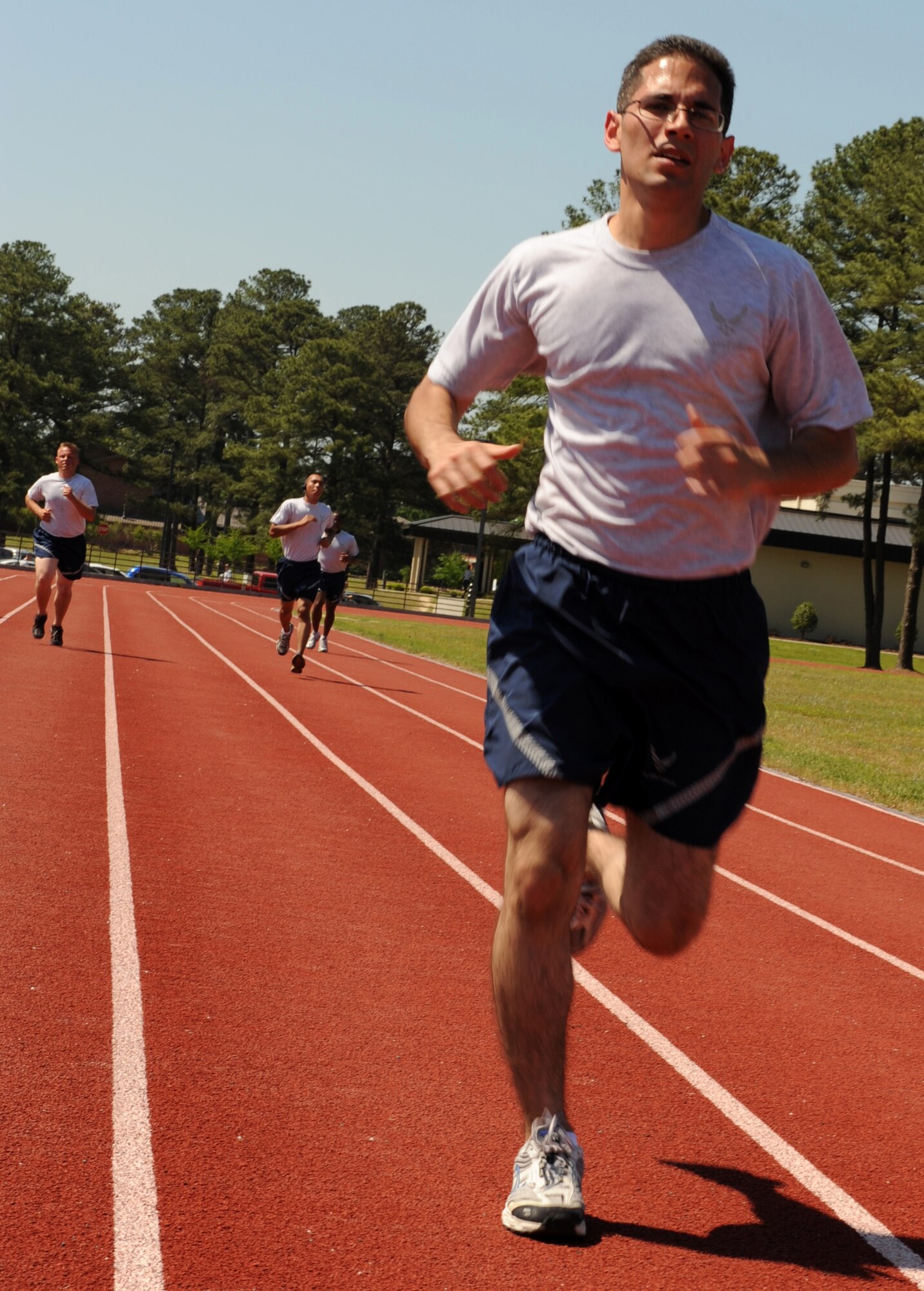 Staff Sgt. Richard Modonado, 4th Component Maintenance Squadron, runs around the track during a physical training session at Seymour Johnson Air Force Base, N.C., April 27,2009. The 4th Fighter Wing will join the nation in observing May as national fitness month by informing Airmen about the importance of physical and mental health and implementing programs such as the running clinic to help improve physical fitness. (U.S. Air Force photo by Airman 1st Class Gino Reyes)