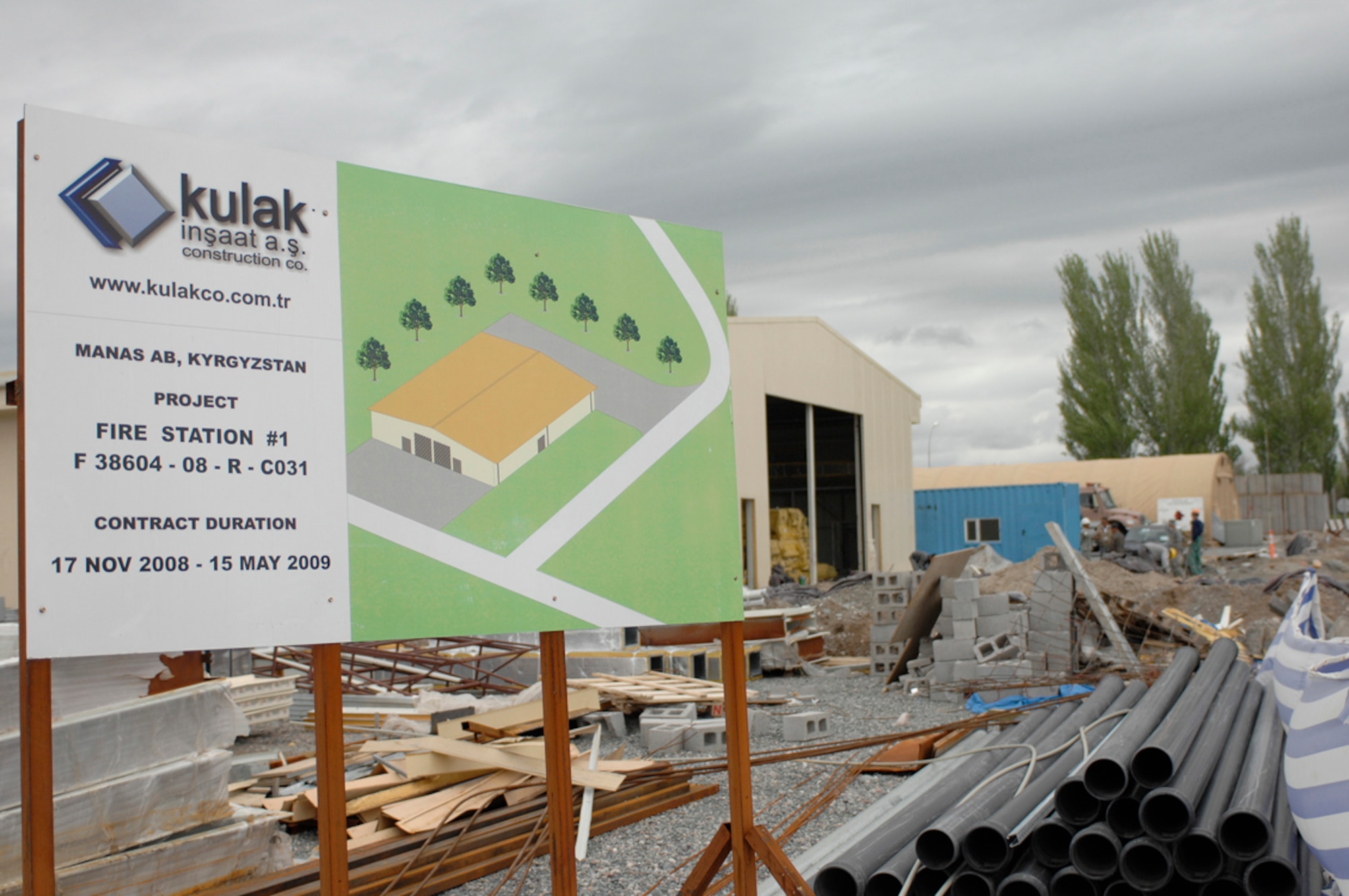 Nearing completion, contract workers with Kulak Construction Company prepare to pour the concrete driveway of the new fire station at Manas Air Base, Kyrgyzstan, April 27. The fire station is projected to be complete around May 15 and will replace a tent station that has been used for more than seven years. It will provide shelter for two trucks, offices and living quarters for firefighters on duty. (U.S. Air Force photo/Master Sgt. Charles M. Wade)