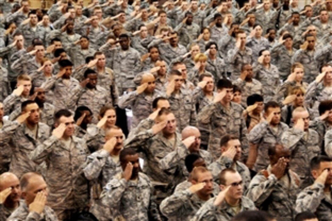 Hundreds of U.S.airmen pay tribute to four Tuskegee Airmen on Joint Base Balad, Iraq, April 24, 2009. The 332nd Air Expeditionary Wing traces its military lineage back to the Tuskegee Airmen, who were part of the 332nd Fighter Group. The airman are assigned to the 332nd Air Expeditionary Wing.