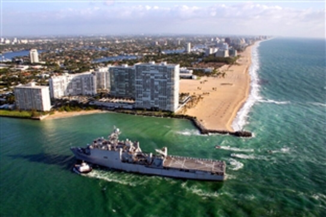 The amphibious dock landing ship USS Ashland enters port on opening day of the annual Fleet Week Port Everglades celebration in South Florida, April 27, 2009. More than 1,000 sailors, Marines and Coast Guardsmen will participate in a number of community outreach activities.