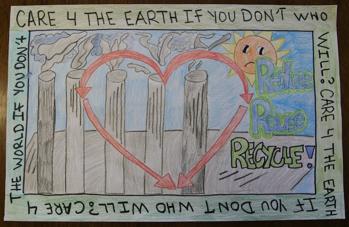 Rachelle Deguzman, a fifth grader at Matthew C. Perry Elementary School, received first place for this poster she created during Earth Week, which was observed here from April 20 to April 24.  A total of 175 students in grades one through five participated in the poster contest, which was judged by a panel of teachers and members of the station’s environmental division.