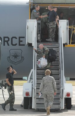 Members from the 434th Air Refueling Wing from Grissom Air Reserve Base, board a KC-135R Stratotanker April 29 at Andersen Air Force Base, Guam. The 434th Air Refueling Wing from Grissom Air Reserve Base, Indiana recently completed a deployment to Andersen in support of Pacific Refueling Operations. During the 120 day deployment they accomplished 162 missions, flew 654 hours, off loaded over 8.2 million pounds of fuel with an overall mission capability rate of 96.2 percent. The 452nd Air Mobility Wing March Air Reserve Base, Calif. will take over Andersen refueling operations. . (U.S. Air Force photo/Master Sgt. Kevin J. Gruenwald)