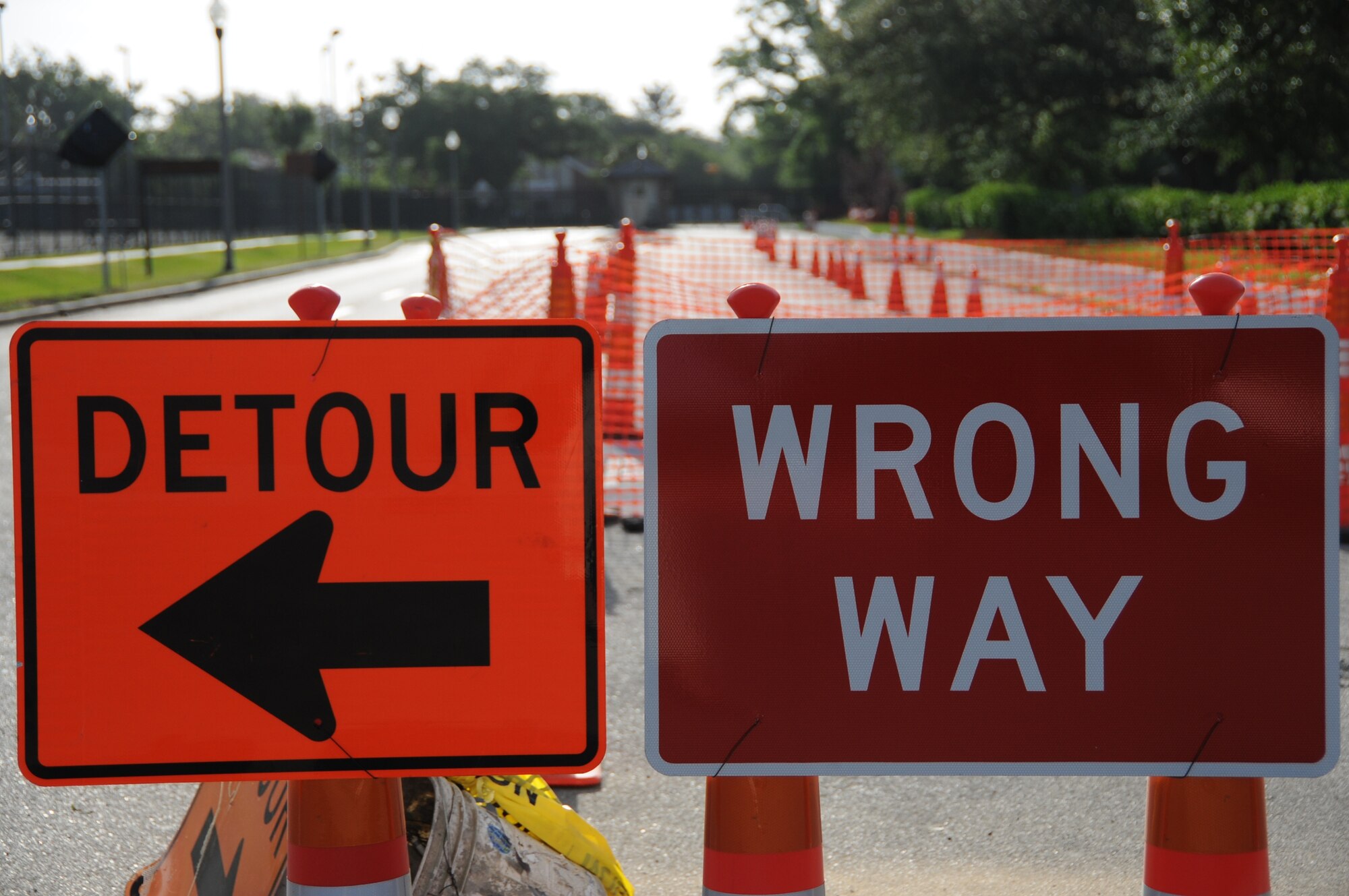 Signs near the Meadows Gate here redirect traffic due to the closure of the gate. (U.S. Air Force photo by Kemberly Groue)