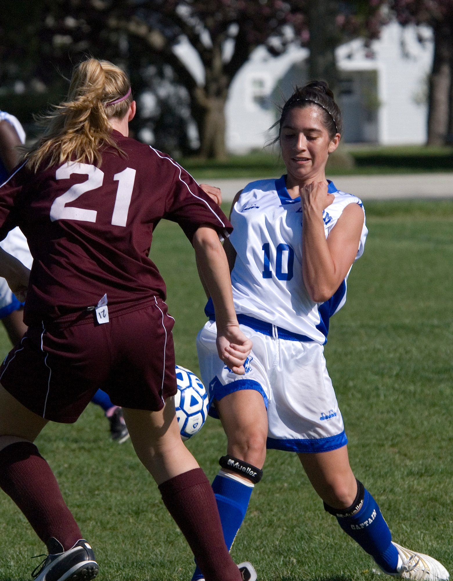 Samantha Nieto (right), Air Base Middle School Falcon mid-fielder, challenges Kira Byler, Milford Middle School Buccaneer mid-fielder, as the two girls shuffle for the ball during a game played at Dover Air Force Base April 27. The Buccaneers beat the Falcons 5 ? 0 in the game. (U.S. Air Force photo/Tech. Sgt. Kevin Wallace)