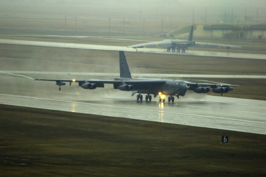 MINOT AIR FORCE BASE, N.D. - A B-52H Stratofortress from Barksdale Air Force Base, La., roars down the runway during the rapid launch portion of Prairie Vigilance 09-7 here April 29. Prairie Vigilance is a combined-wing nuclear operational readiness exercise designed to demonstrate safe, secure, reliable nuclear weapons standards and procedures. A sequence of 12 B-52s successfully launched confirming the Air Force’s agile ability to respond when called upon.  (U.S. Air Force photo by Tech. Sgt. Lee A. Osberry Jr.)