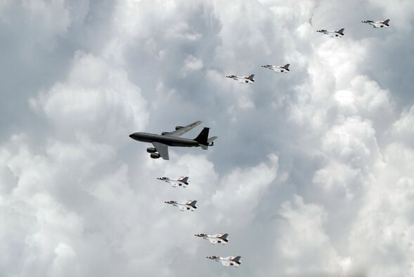 ALTUS AIR FORCE BASE, Okla. – A KC-135 Stratotanker from McConnell Air Force Base, Kansas flies in formation with the Thunderbirds enroute to an air show held at the new Ceiba Airport, in Ceiba, Puerto Rico April 18 and 19. Altus and McConnell tankers supported the Thunderbirds by refueling the jets and enabling them to perform at the former U.S. Navy's Roosevelt Roads Naval Base for the first time in 30 years.  (U.S.Air Force photo/Senior Airman Jennifer L. Flores)