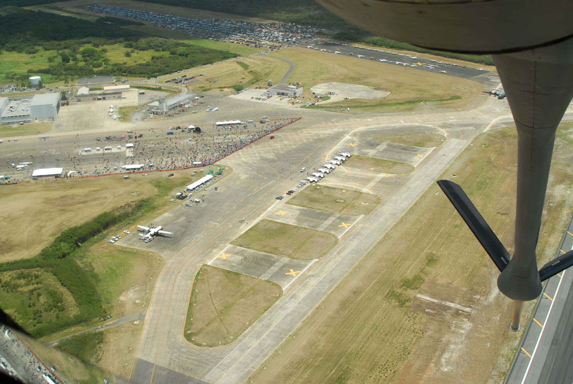 ALTUS AIR FORCE BASE, Okla. – Altus KC-135 Stratotanker flies with its boom hanging down across the new Ceiba Airport, in Ceiba, Puerto Rico, April 18 and 19.  (U.S.Air Force photo/Senior Airman Jennifer L. Flores)