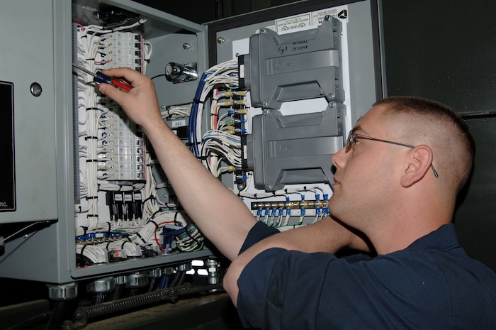 Senior Airman Jacob Thomas adjusts the blower motor speed for the heater on a Global ER-2875 extended reach aircraft deicer at the vehicle maintenance shop here April 29. Vehicle maintainers are currently receiving first-hand training on Charleston AFB's first Global ER-2875 extended reach aircraft deicer. Airman Thomas is assigned to the 437th Logistics Readiness Squadron as a multi-purpose maintenance journeyman. (U.S. Air Force photo/Staff Sgt. Marie Cassetty)(RELEASED)