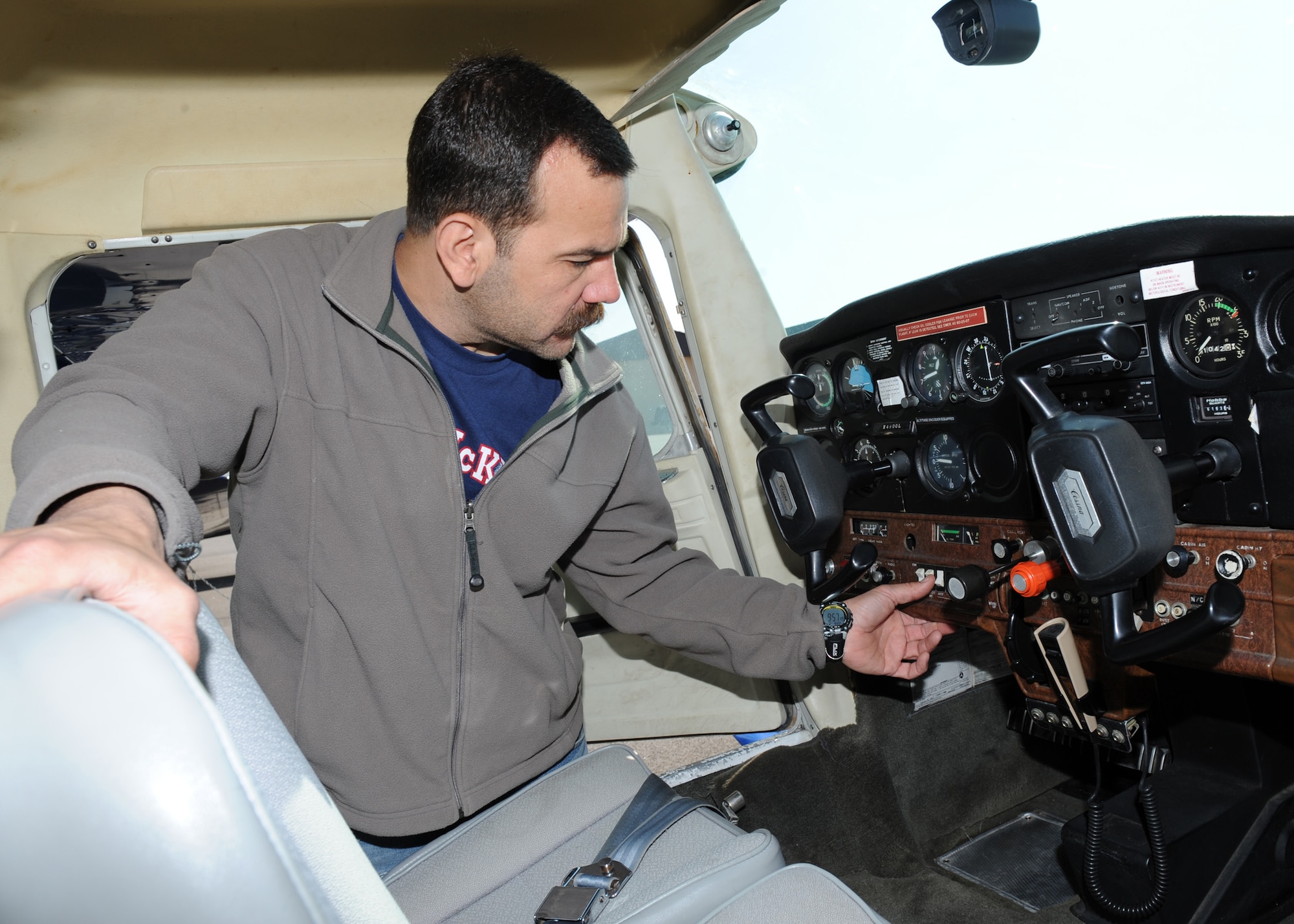 SCOTT AIR FORCE BASE, Ill. --Mr. Tucker checks the Cessna 152’s instruments before entering the plane. The Cessna 152 is a common training plane that the Aero Club uses. (U.S. Air Force photo/Staff Sgt. Paul Villanueva II)