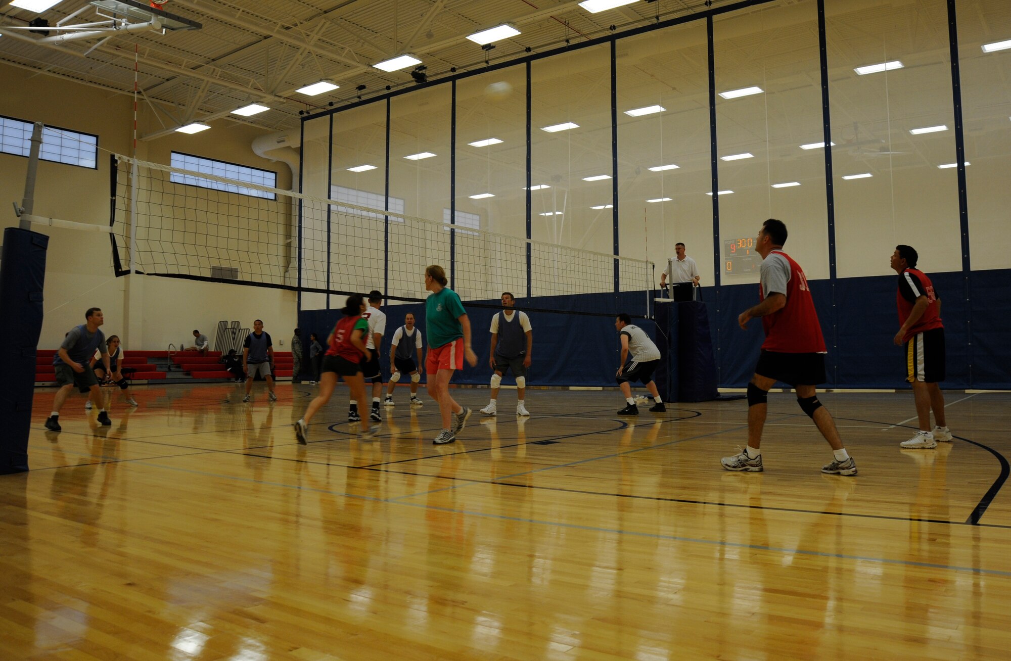 VANDENBERG AIR FORCE BASE, Calif. -- Making use of the whole court, members of the 30th Operations Group and the 30th Launch Group play an intramural volleyball game recently. The 30th OG came out the victors in the three-game match, winning game three 15-7. (U.S. Air Force Photo/ Senior Airman Stephanie Longoria)