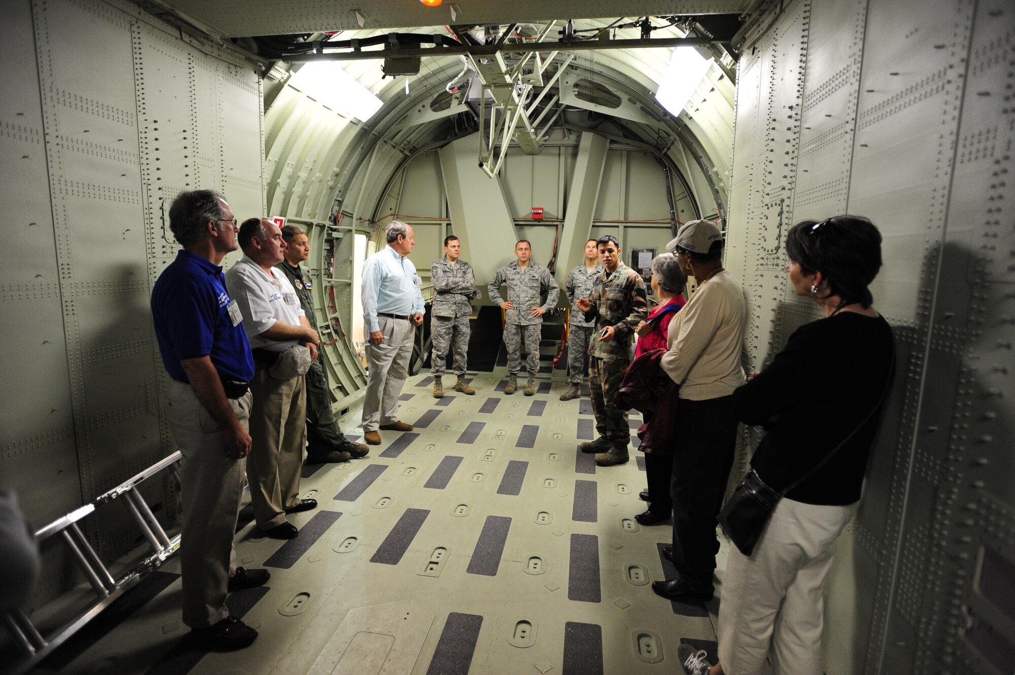 Twenty three civic leaders from Harnett, Moore and Cumberland Counties tour a C-130E at Little Rock Air Force Base, Ark., April 23 during a two-day Community Relations Tour for a behind-the-scenes look at the mobility mission.  The 43rd Airlift Wing hosted the civic leaders who toured the training facilities for C-130 pilots, navigators and maintenance crews at Little Rock AFB and the 618th Tactical Airlift Control Center at Scott AFB, Ill., which moves troops and cargo to and from the Central Command Area of Responsibility. They also toured AMC headquarters. (U.S. Air Force photo by photo by Senior Airman Steele Britton)