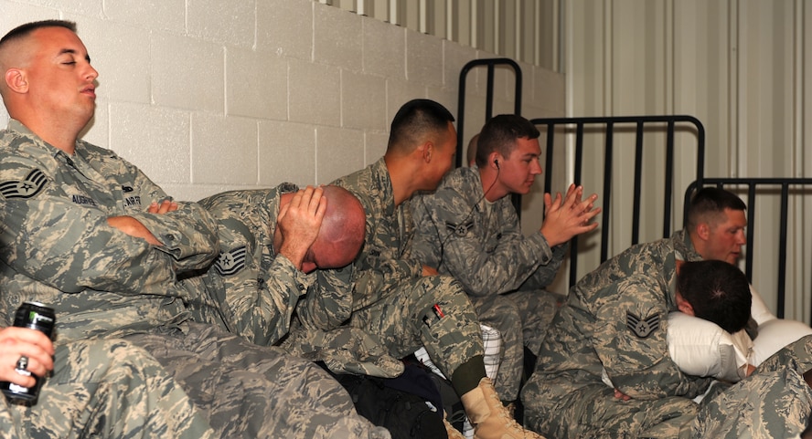 Members of the 4th Fighter Wing sit and relax at the personnel deployment facility(PDF) at Seymour Johnson Air Force, N.C., April 29, 2009. Approximately 300 Airmen went through the PDF to receive their final briefings before being deployed to Bagram Air Base, Afghanistan. (U.S. Air Force photo by Airman 1st Class Gino Reyes)