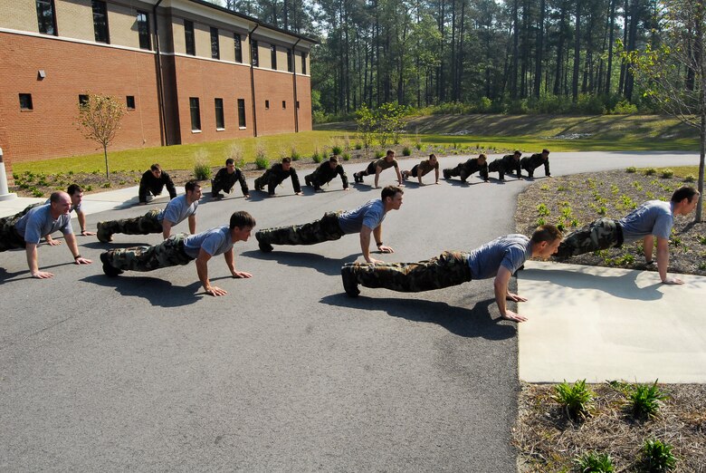 Trainees and instructors at the Combat Control School at Pope Air Force Base, N.C. perform "memorials" April 24. "Memorials" is a PT session recognizing the sacrifice of the 52 Combat Controllers who were killed in action. (U.S Air Force Photo by Tech. Sgt. Todd Wivell)