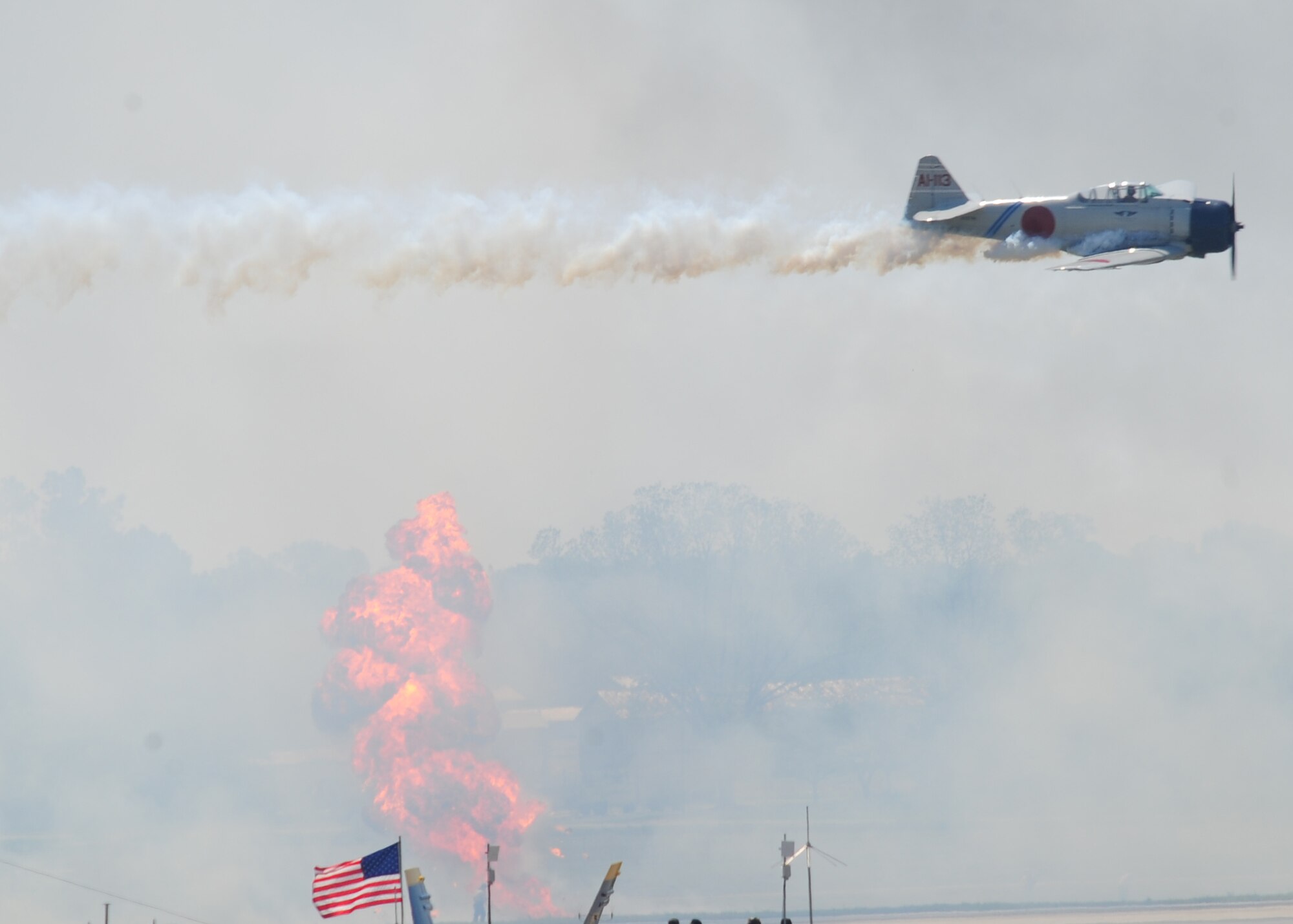 A vintage Japanese aircraft performs during the Tora! Tora! Tora! Pearl Harbor attack re-enactment for the Wings Over Wayne Air Show at Seymour Johnson Air Force Base, N.C., April 25th, 2009. Over 2,400 Americans lost their lives when Pearl Harbor was bombed by the Japanese on December 7, 1941. (U.S. Air Force photo by Airman 1st Class Rae Perry)