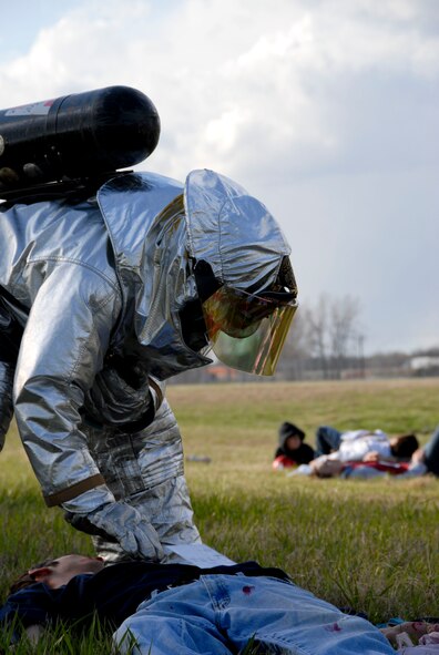 Members of the 180th Fighter Wing fire department participated in an aircraft crash and recovery exercise at the Toledo Express Airport on April 22. The drill, required every three years, not only tests the response of airport authorities, but also the response of other local emergency, fire and rescue crews that would normally respond to such an incident, to include the 180th FW fire department. USAF photo by Tech. Sgt. Beth Holliker (Released)