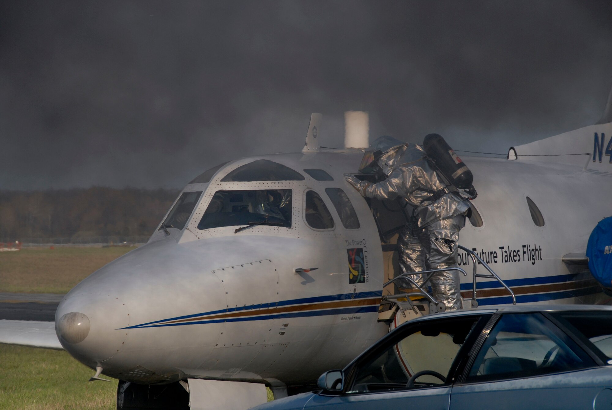 Members of the 180th Fighter Wing fire department participated in an aircraft crash and recovery exercise at the Toledo Express Airport on April 22. The drill, required every three years, not only tests the response of airport authorities, but also the response of other local emergency, fire and rescue crews that would normally respond to such an incident, to include the 180th FW fire department. USAF photo by Tech. Sgt. Beth Holliker (Released)