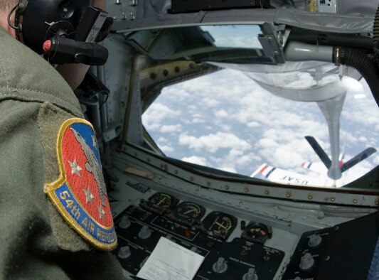 ALTUS AIR FORCE BASE, Okla. -- Tech. Sgt. Justin Poteet, 54th Air Refueling Squadron boom operator, refuels one of the eight Thunderbirds that participated in an air show held at the new Ceiba Airport, in Ceiba, Puerto Rico, April 18 and 19. Altus’ support in refueling enabled the Thunderbirds to perform at the former U.S. Navy's Roosevelt Roads Naval Base for the first time in 30 years. The Altus KC-135 offloaded 19,746 gallons of fuel to the Thunderbirds. (U.S. Air Force photo/Airman 1st Class Leandra D. Hernandez)