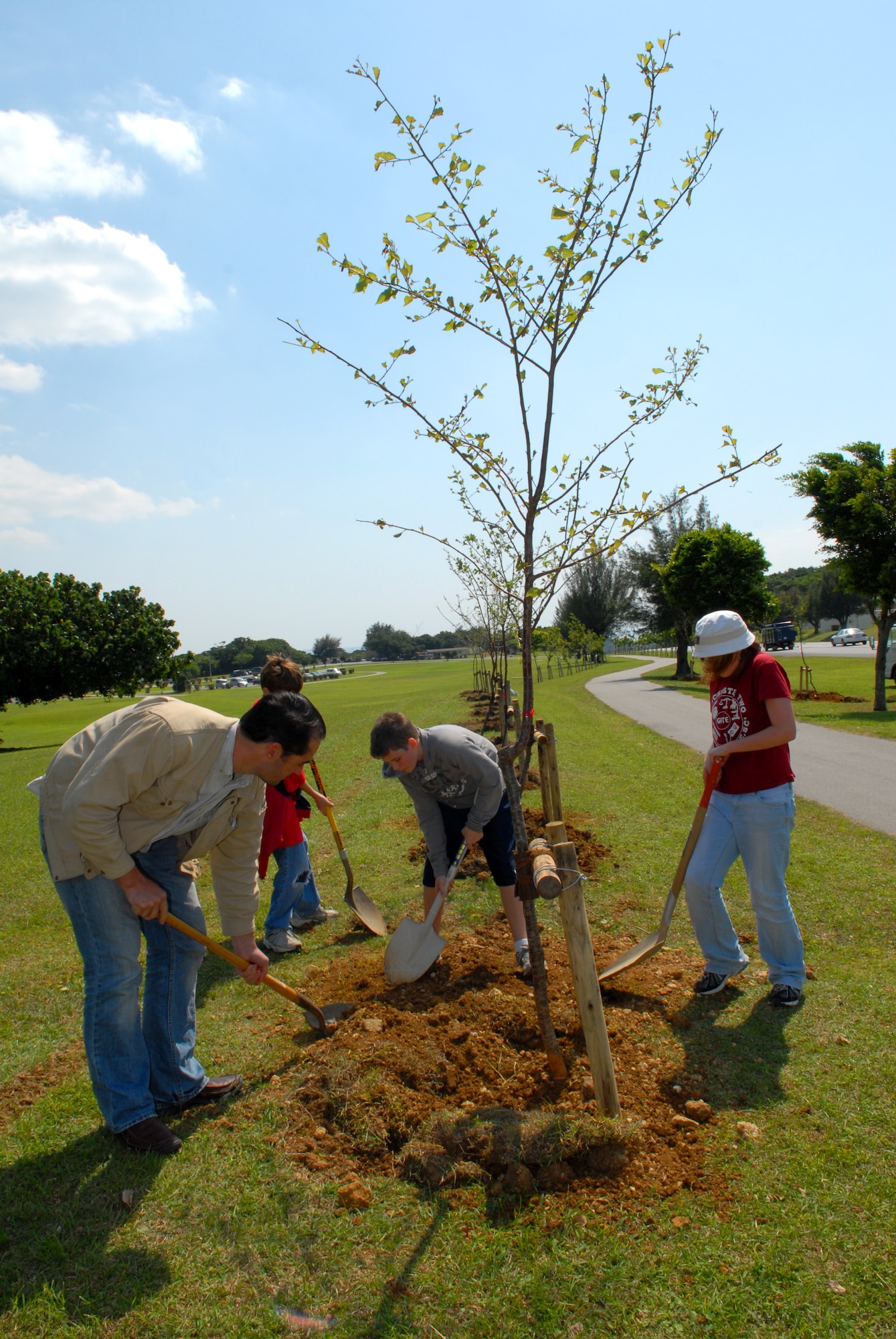Club ZERO participates in a tree planting event with the Kadena Recycle Center at Marek Park, Kadena Air Base, Japan, April 28.  (U.S. Air Force photo/Tech. Sgt. Rey Ramon) 