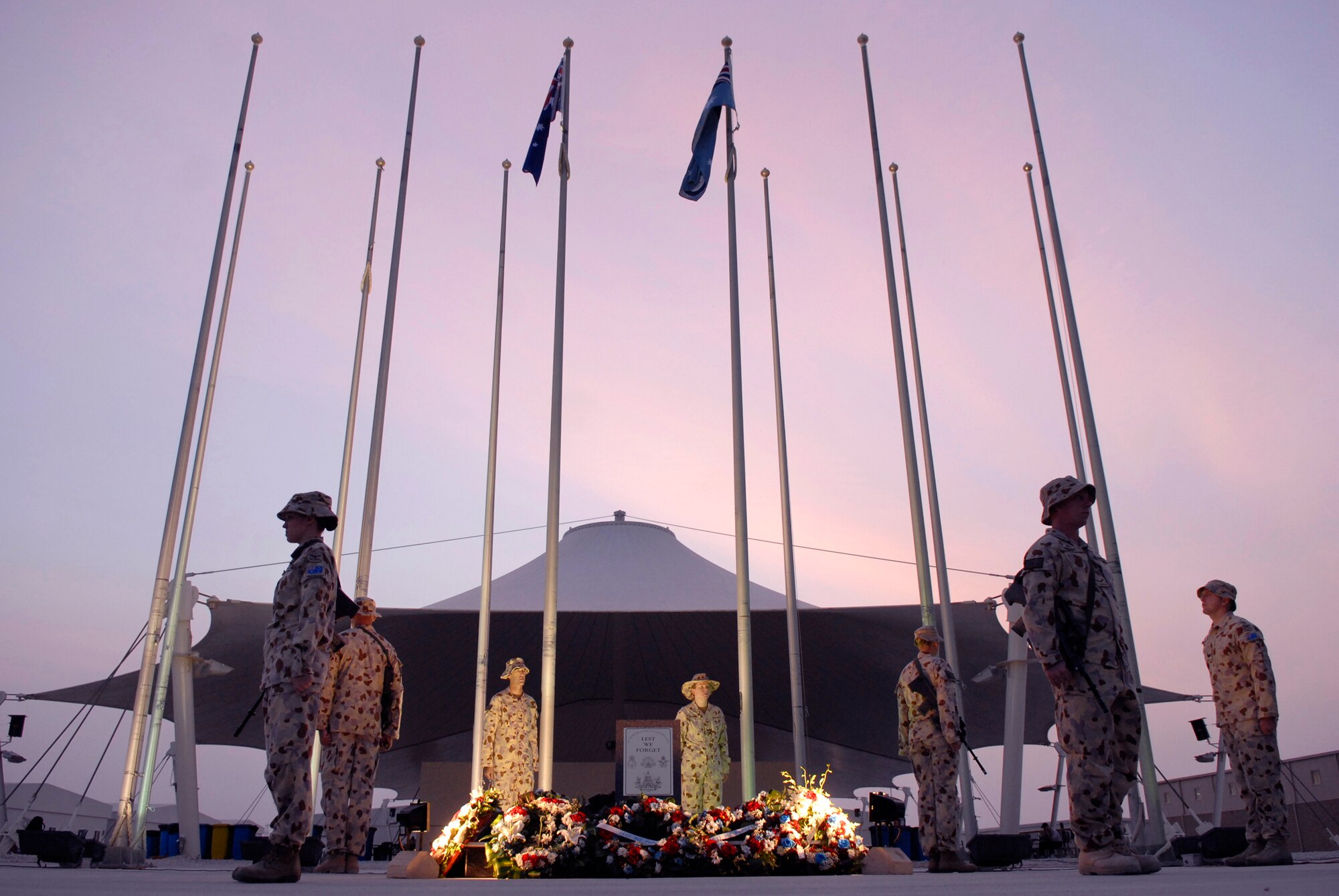 The Cenotaph Party stands guard during the honoring of fallen Royal Australian military members during Australia and New Zealand Army Corps (ANZAC) Day, April 25, 2009, at an undisclosed location in Southwest Asia.  ANZAC Day is a national day of remembrance in Australia and New Zealand to honor the members of ANZAC who fought at Gallipoli in World War I and more broadly commemorates all those who have died and served in military operations for the country.  The military members who attended the event are deployed in support of Operations Iraqi and Enduring Freedom and Combined Joint Task Force - Horn of Africa.  (U.S. Air Force photo/Senior Airman Andrew Satran/released)