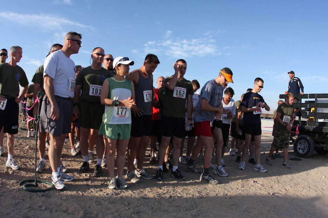 The runners wait in anticipation for the start of the eight kilometer (4.97 mile) race through the ridges behind the Combat Center’s main side during the 23rd annual ridge run April 30.