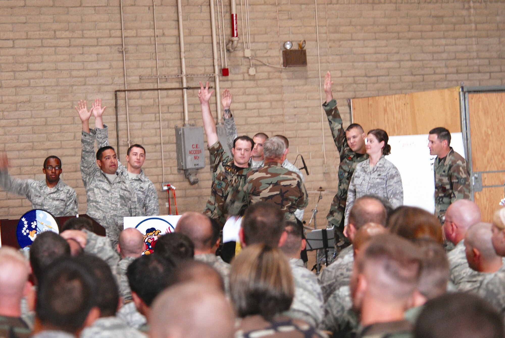 The 56th Aircraft Maintenance Squadron, comprised of the 61st, 62nd and 309th Aircraft Maintenance Units, engage in a game of jeopardy to prepare for the upcoming unit compliance inspection beginning May 4 at Luke Air Force Base. (U.S. Air Force photo)