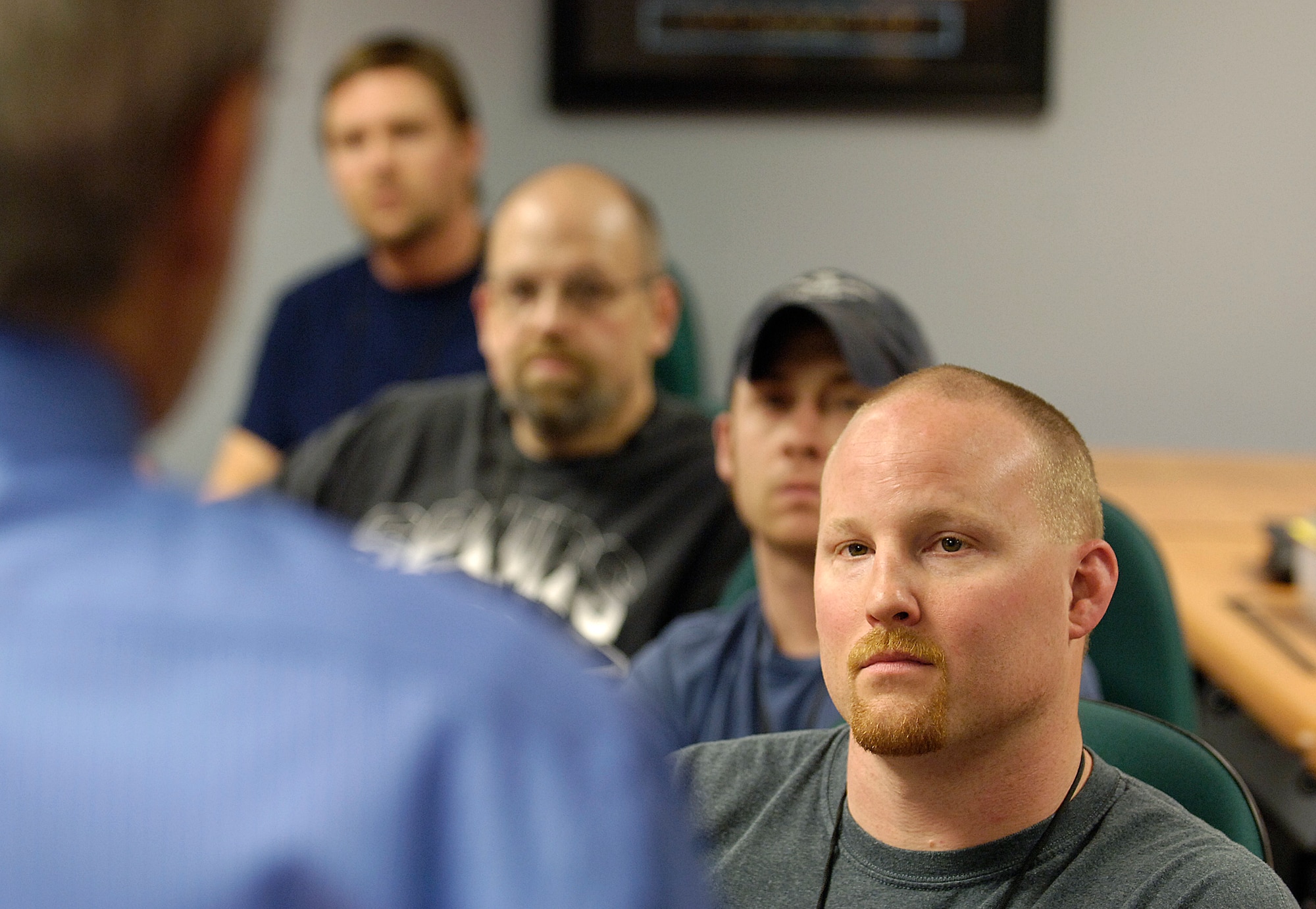 Students of Tinker’s new Airframe and Powerplant Certification program listen to welcoming remarks. The Federal Aviation Administration-certified program is held in the evenings. (Air Force photo/Margo Wright)