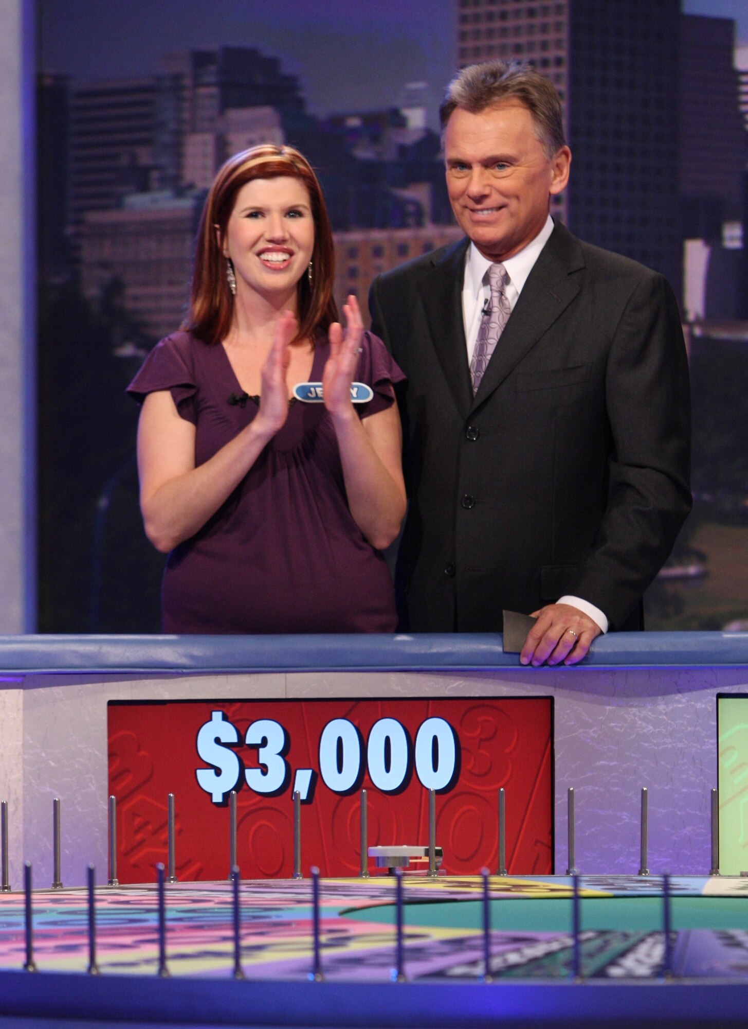 VANDENBERG AIR FORCE BASE, Calif. – Jenny Rojek, a 576th Flight Launch Test Squadron logistics forms specialist, and television personality Pat Sajak, the game show host of Wheel of Fortune, converse during a taping of the March 4 episode in Los Angeles. Being a contestant on a game show like Wheel of Fortune has been a longtime dream for Mrs. Rojek. (Photo courtesy of Wheel of Fortune)