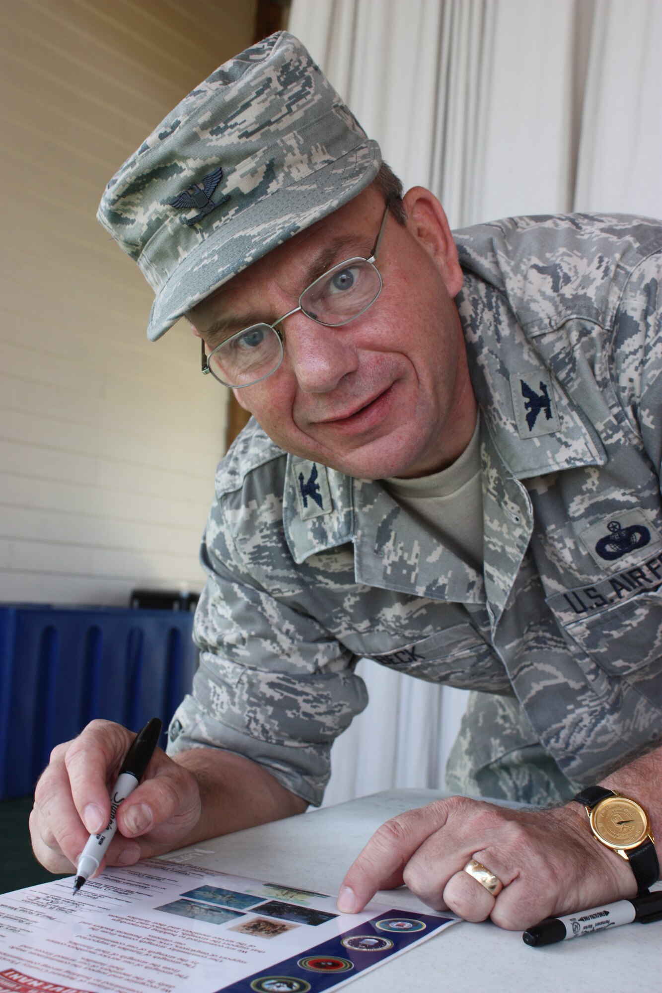 45th Mission Support Group Commander Col. Charles Beck took time April 25 to proudly sign the Brevard Armed Forces Covenant, signifying Brevard County's commitment to supporting members of the Armed Forces and their families, at Wickham Park during the  22nd Annual Vietnam and All Veterans Reunion. "A lot of people thank me for my service," Colonel Beck said to the gathered crowd, "but our veterans here today never stopped serving." (U.S. Air Force photo/Airman 1st Class David Dobrydney)