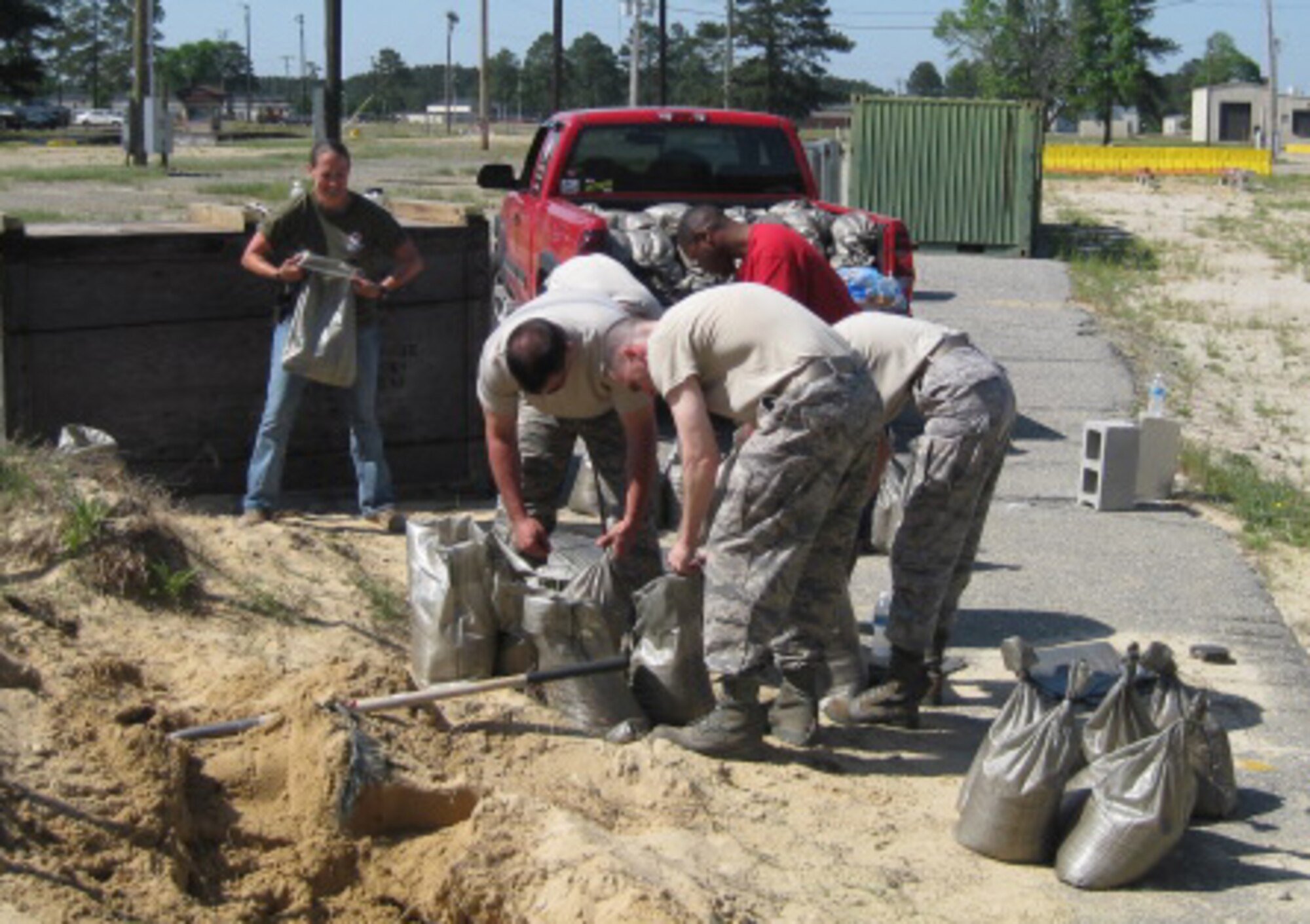 SEYMOUR JOHNSON AIR FORCE BASE, N.C. -- Committee members and volunteers make sandbags for the 916th Air Refueling Wing Combat Dining In scheduled for Saturday, May 2.  More than 175 reservists and active duty members will participate in an evening of fun and comraderie.