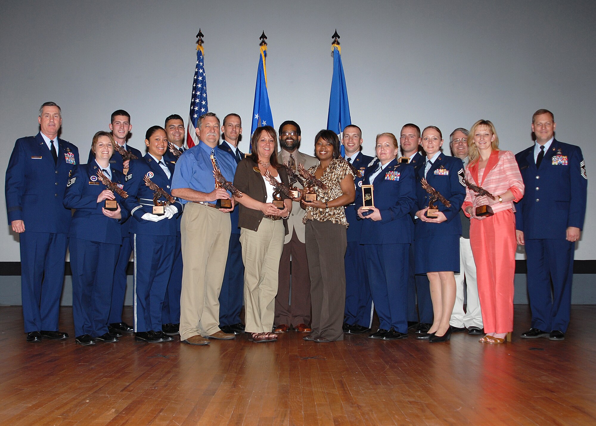 82nd Training Wing quarterly award winners for the 2009 first quarter pose with their awards April 27 with 82nd TRW Commander Brig. Gen. O.G. Mannon. From left to right: General Mannon, Staff Sgt. Cori Ash 882nd Training Group, Airman Keenan Mondragon, 82nd Mission Support Group, 1st Lt. Daniel Chavez, 882nd TRG, Douglas Jansing, 82nd MSG, Master Sgt. Kevin Taylor, 782nd TRG, Marnie Thomas, 82nd MSG, Alfred Harris, 782nd TRG, Sherese Bunkley, 82nd Medical Group, Staff Sgt. Steve Zarecki, 982nd TRG, Maj. Tammy St .Armand, 882nd TRG, Staff Sgt. Jason Henderson, 782nd TRG, Senior Master Sgt. Rebecca Brauer, 82nd TRW, Ronald Loeffler, 82nd TRG, 82nd TRW Command Chief, Chief Master Sgt. Kenneth Sallinger.  (U.S. Air Force photo/Lou Anne Sledge)