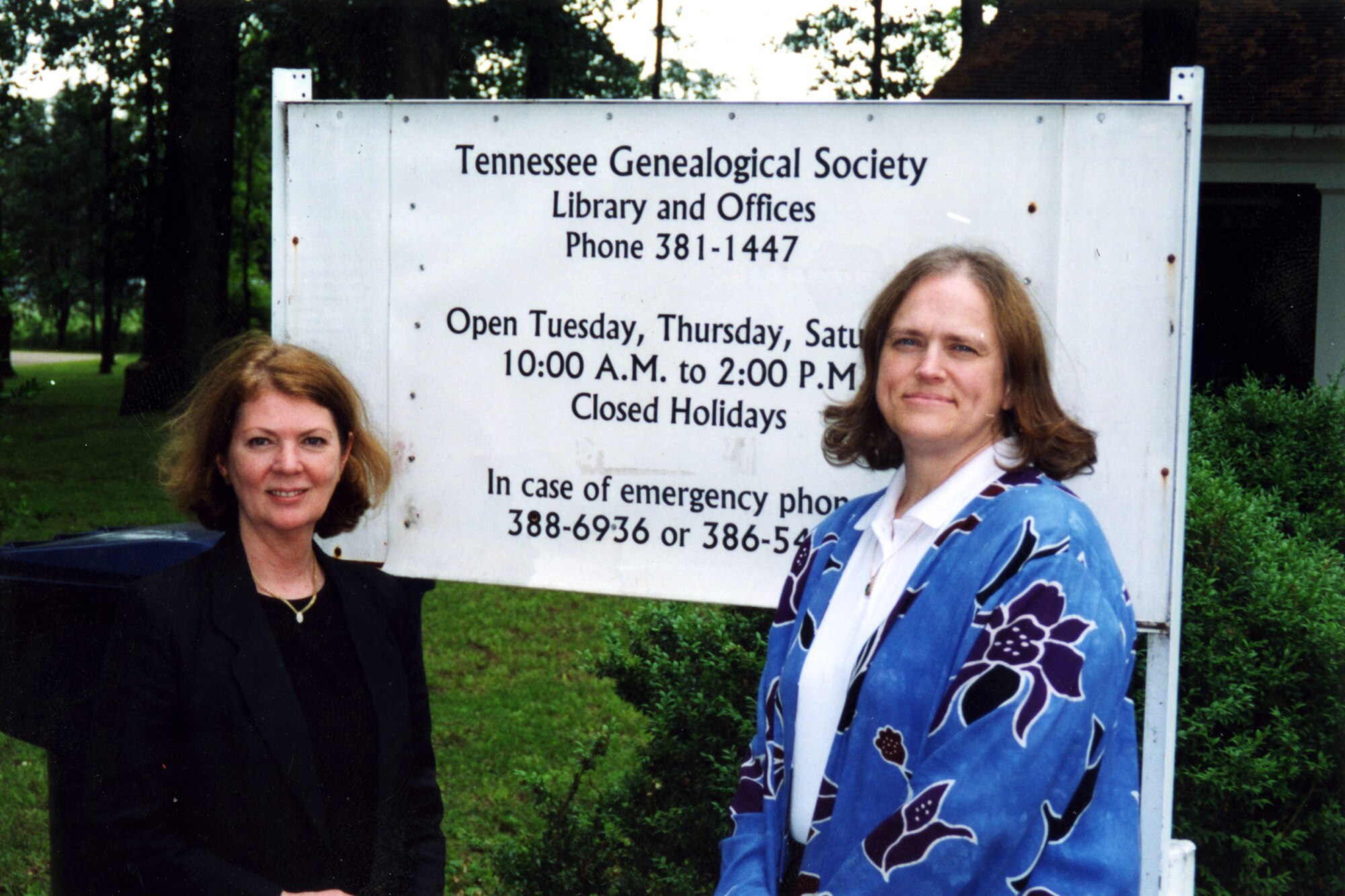 From left, Cheryl Richards, a distant cousin through the Overstreet-Sevier families, stands with Pixy Morgan, a past vice president with the Tennessee Genealogical Society, in front of the former headquarters in Brunswick, Tenn.  Morgan is the author of “Six Generations of Overstreets and their Allied Families: Beginning 18th Century Virginia to 20th Century Middle Tennessee, Knox, Overton, Clay and Jackson Counties.” Morgan has also helped Judy Henry, a southern Louisiana native and retired teacher, with tracing her husband’s family history. A fellow genealogy aficionado, Henry said that Morgan has not only contributed significantly to her own research, but their online encounter has been “a real pleasure to get to know a bit about her personally, too, over the years, as well as, collaborate on our research.”  She added that Morgan “makes a quality contribution to any endeavor she pursues.” (Photo provided)