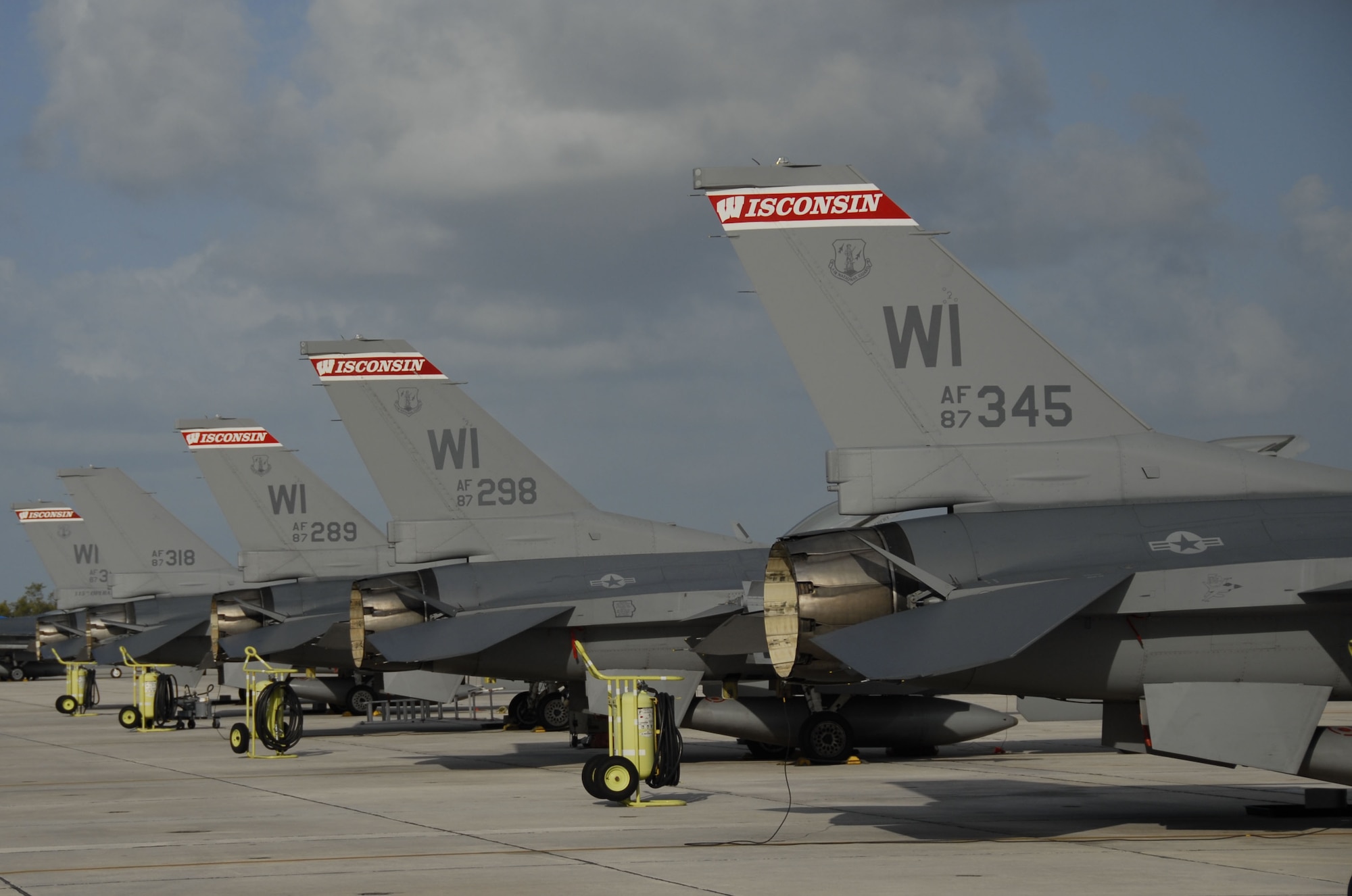 F-16 Fighting Falcons sit on the ramp at Naval Air Station Key West., Fla.  Pilots from the Wisconsin Air National Guard's 115th Fighter Wing in Madison honed their air-to-air combat training skills along side their naval counterparts from Strike Fighter Squadron 2, NAS Lemoore, Calif., during a two-week training exercise. (U.S. Air Force photo/Master Sgt. Dan Richardson)