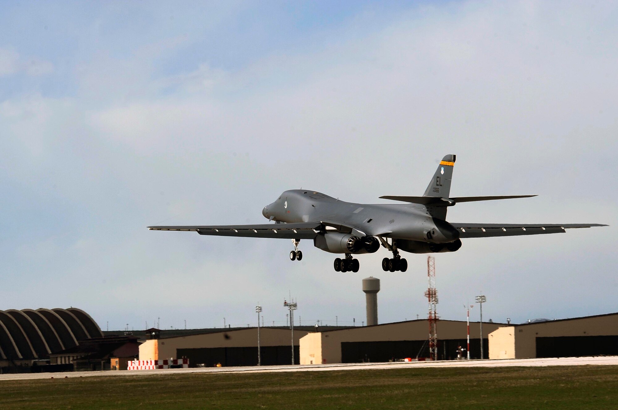 A B-1B Lancer assigned to the 37th Bomb Squadron lands here, April 29, for the first time since a 2005 mishap at Andersen Air Force Base, Guam.  This B-1 received more than 15,000 hours in repairs from the 565th Aircraft Maintenance Squadron of Tinker Air Force Base, Okla., and the 28th Maintenance Group of Ellsworth. (U.S. Air Force photo by Airman 1st Class Corey Hook)