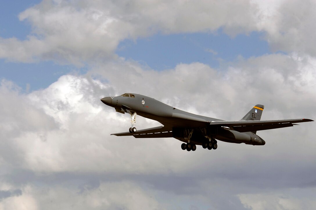 A B-1B Lancer assigned to the 37th Bomb Squadron lands here, April 29, for the first time since a 2005 mishap at Andersen Air Force Base, Guam. This B-1 received more than 15,000 hours in repairs from the 565th Aircraft Maintenance Squadron of Tinker Air Force Base, Okla., and the 28th Maintenance Group of Ellsworth. (U.S. Air Force photo by Airman 1st Class Corey Hook)