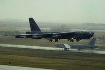 MINOT AIR FORCE BASE, N.D. - A B-52H Stratofortress from Barksdale Air Force Base, La., soars through the elements during the rapid launch portion of Prairie Vigilance 09-7 here April 29. Prairie Vigilance is a combined-wing nuclear operational readiness exercise designed to demonstrate safe, secure, reliable nuclear weapons standards and procedures.  A sequence of 12 B-52s successfully launched confirming the Air Force’s agile ability to respond when called upon.  (U.S. Air Force photo by Tech. Sgt. Lee A. Osberry Jr.)