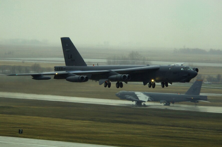 MINOT AIR FORCE BASE, N.D. - A B-52H Stratofortress from Barksdale Air Force Base, La., soars through the elements during the rapid launch portion of Prairie Vigilance 09-7 here April 29. Prairie Vigilance is a combined-wing nuclear operational readiness exercise designed to demonstrate safe, secure, reliable nuclear weapons standards and procedures.  A sequence of 12 B-52s successfully launched confirming the Air Force’s agile ability to respond when called upon.  (U.S. Air Force photo by Tech. Sgt. Lee A. Osberry Jr.)