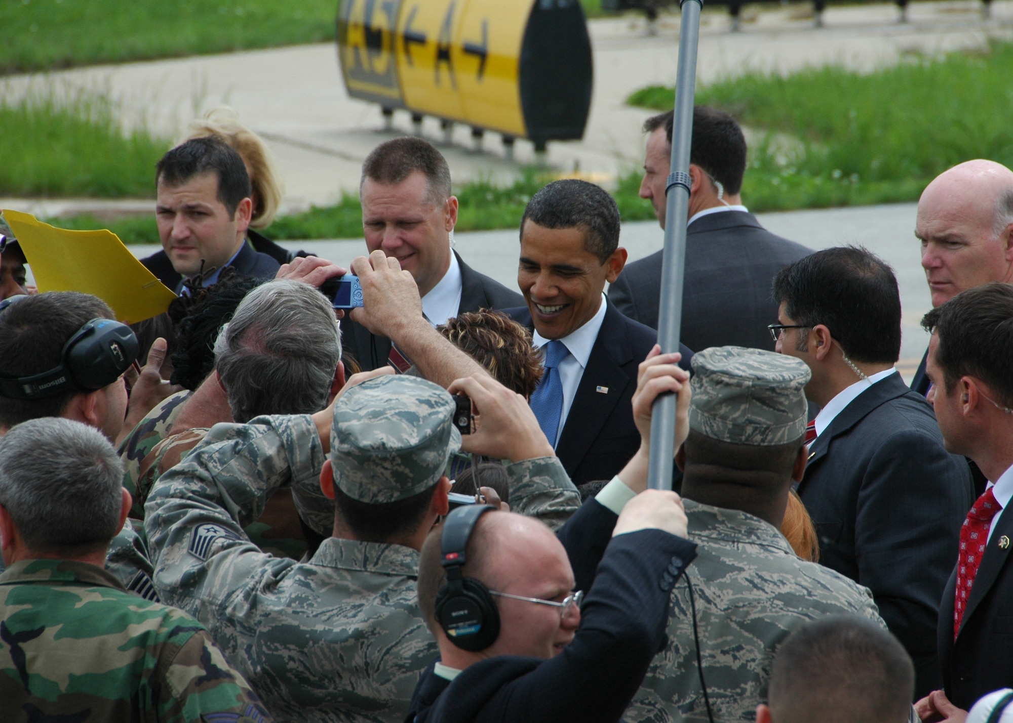 President Barack Obama greets members of the 131st Fighter Wing, Missouri Air National Guard, at Lambert-Saint Louis International Airport prior to his departure on Air Force One on April 29.  President Obama marked his 100th day in office with a Town Hall Meeting in Arnold, a surburb of Saint Louis, earlier that day. (U.S. Air Force Photo by Master Sergeant Mary-Dale Amison)  (RELEASED)